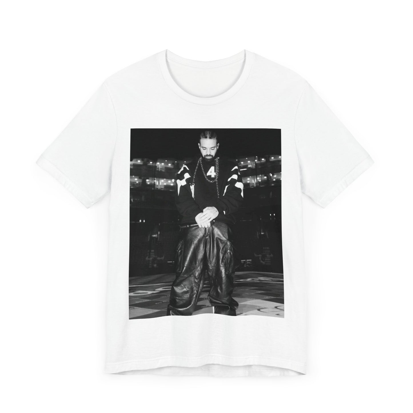 A black graphic t-shirt featuring a black and white aesthetic graphic of Drake, possibly with tour elements.