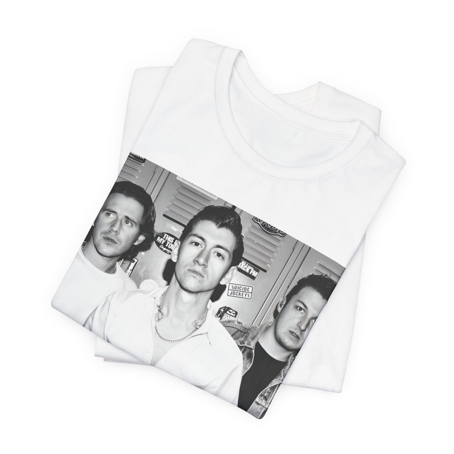A black graphic t-shirt featuring a vintage-style design related to Arctic Monkeys' 'AM' album era, possibly with the album art or band imagery.