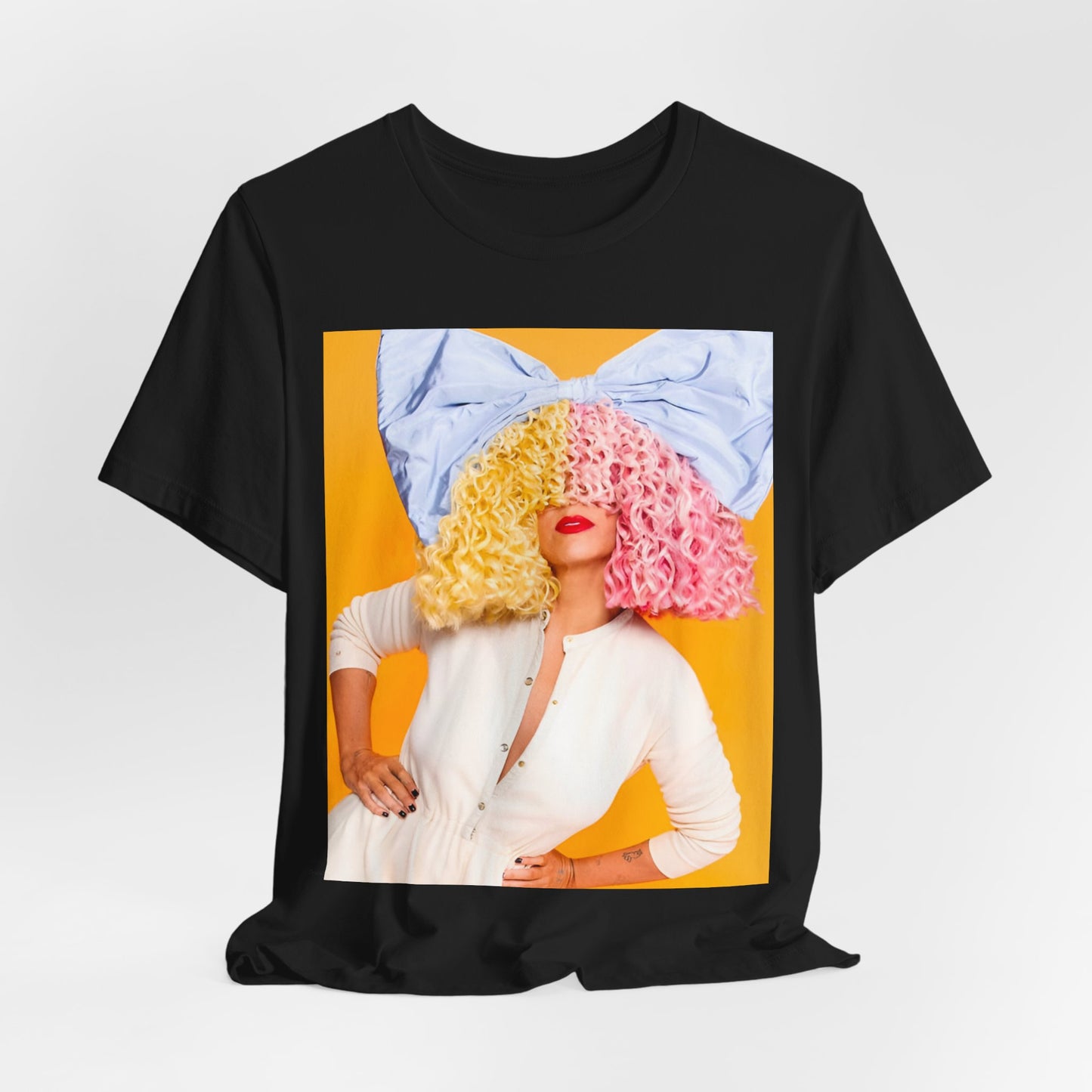 A black graphic t-shirt featuring a chill indie pop graphic of Sia.
