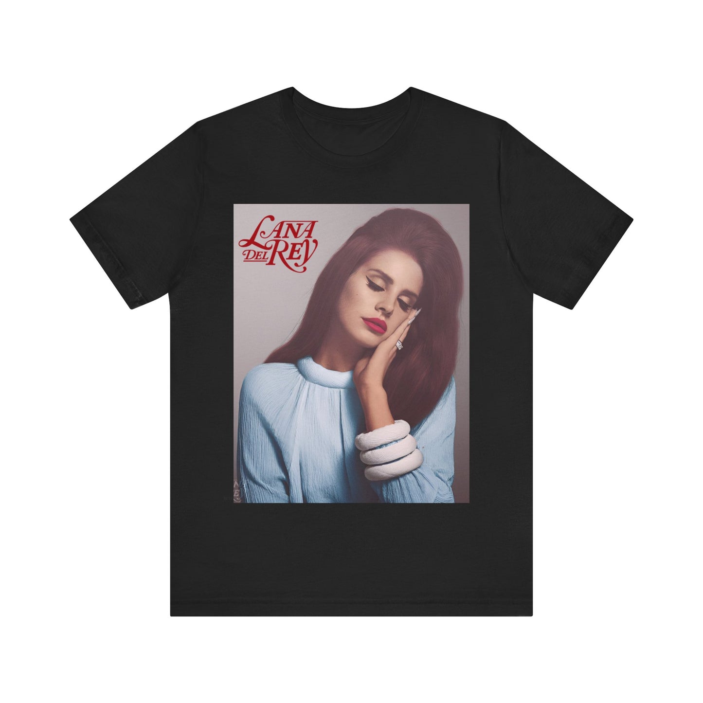 The iconic single cover art for Lana Del Rey's "Born to Die," showing her with eyes closed and hand on her cheek, printed on a t-shirt.