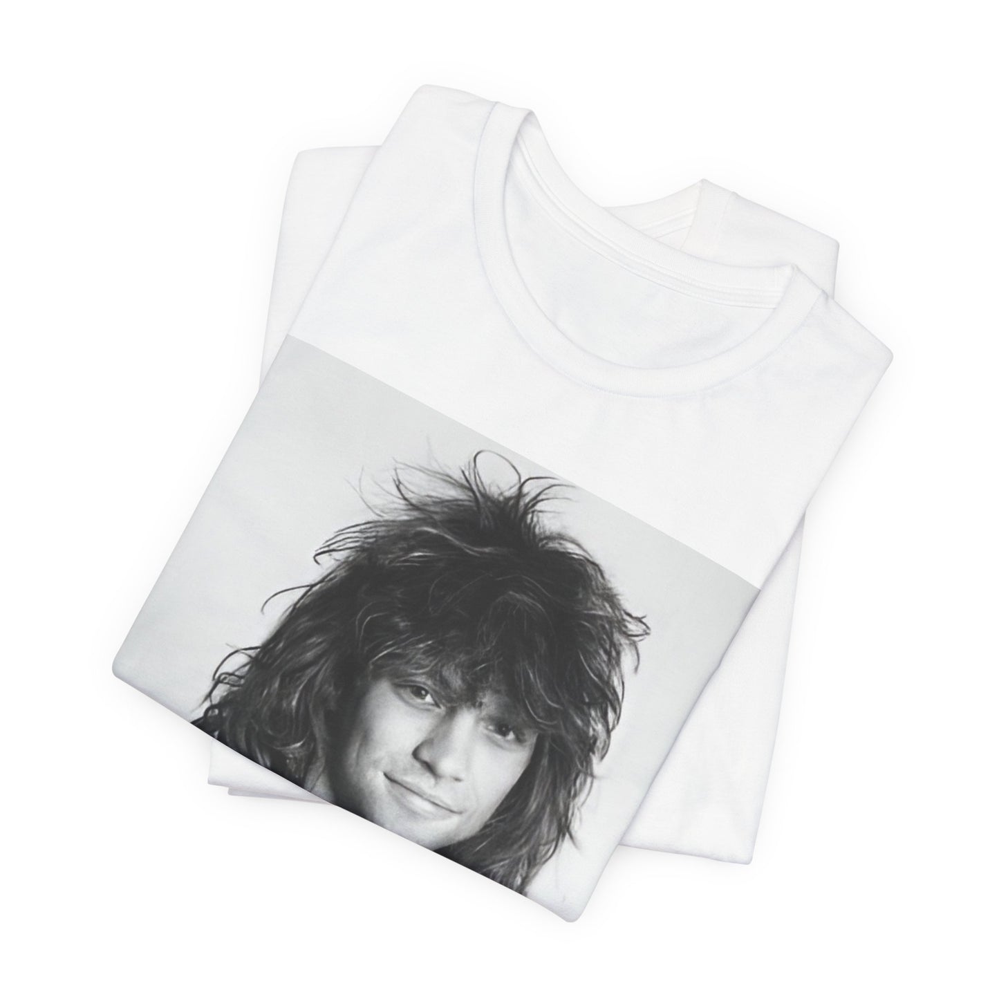 A black graphic t-shirt featuring a black and white photo of Bon Jovi from a 90s tour, performing on stage.