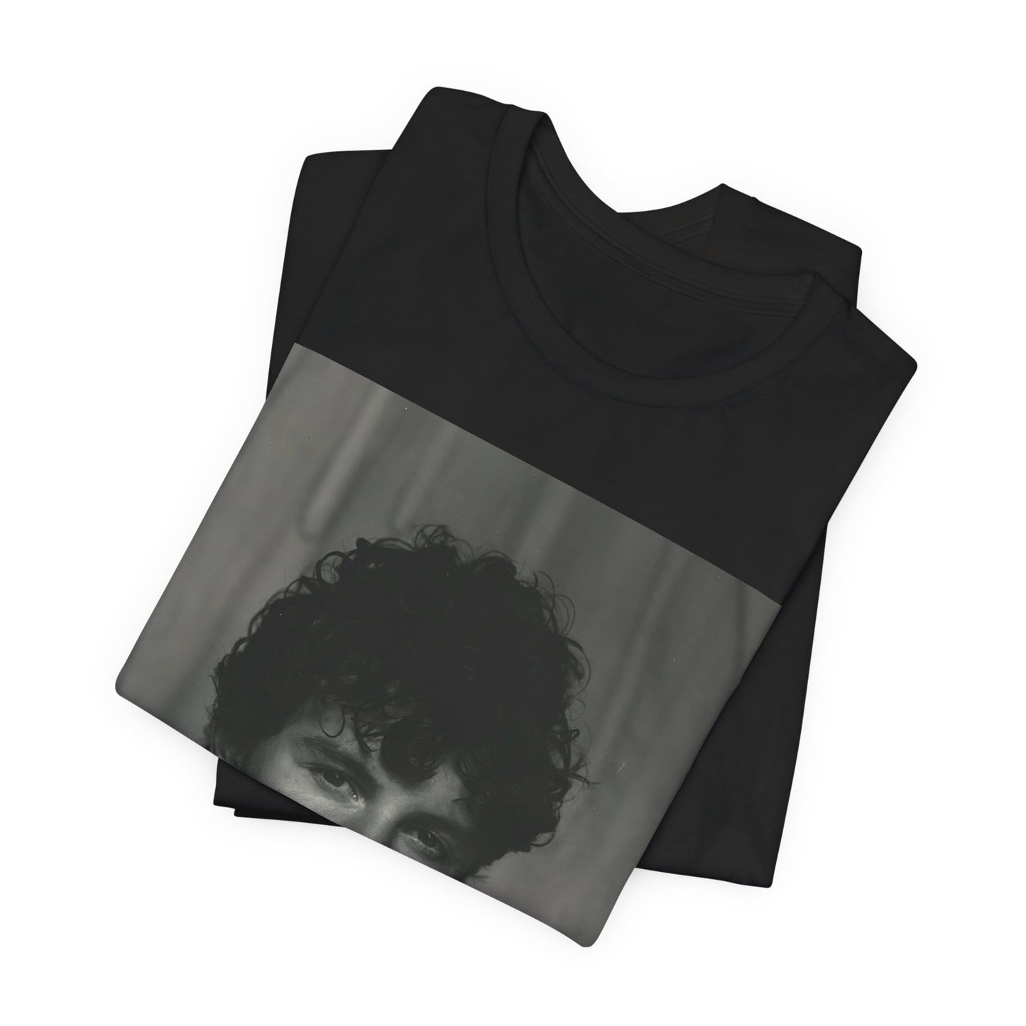 A black graphic t-shirt featuring a fearless portrait graphic of Shawn Mendes.