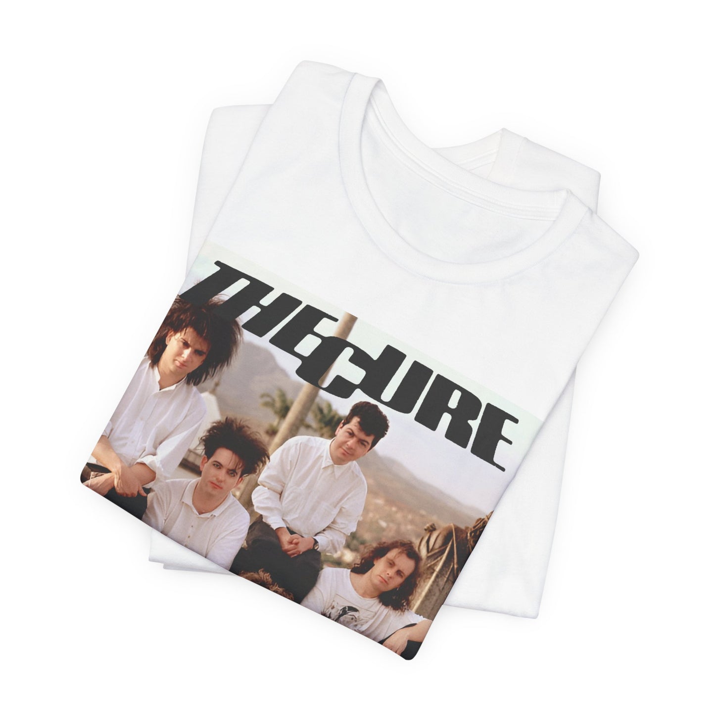 A black graphic t-shirt featuring a vintage graphic of The Cure with a dark romanticism theme.