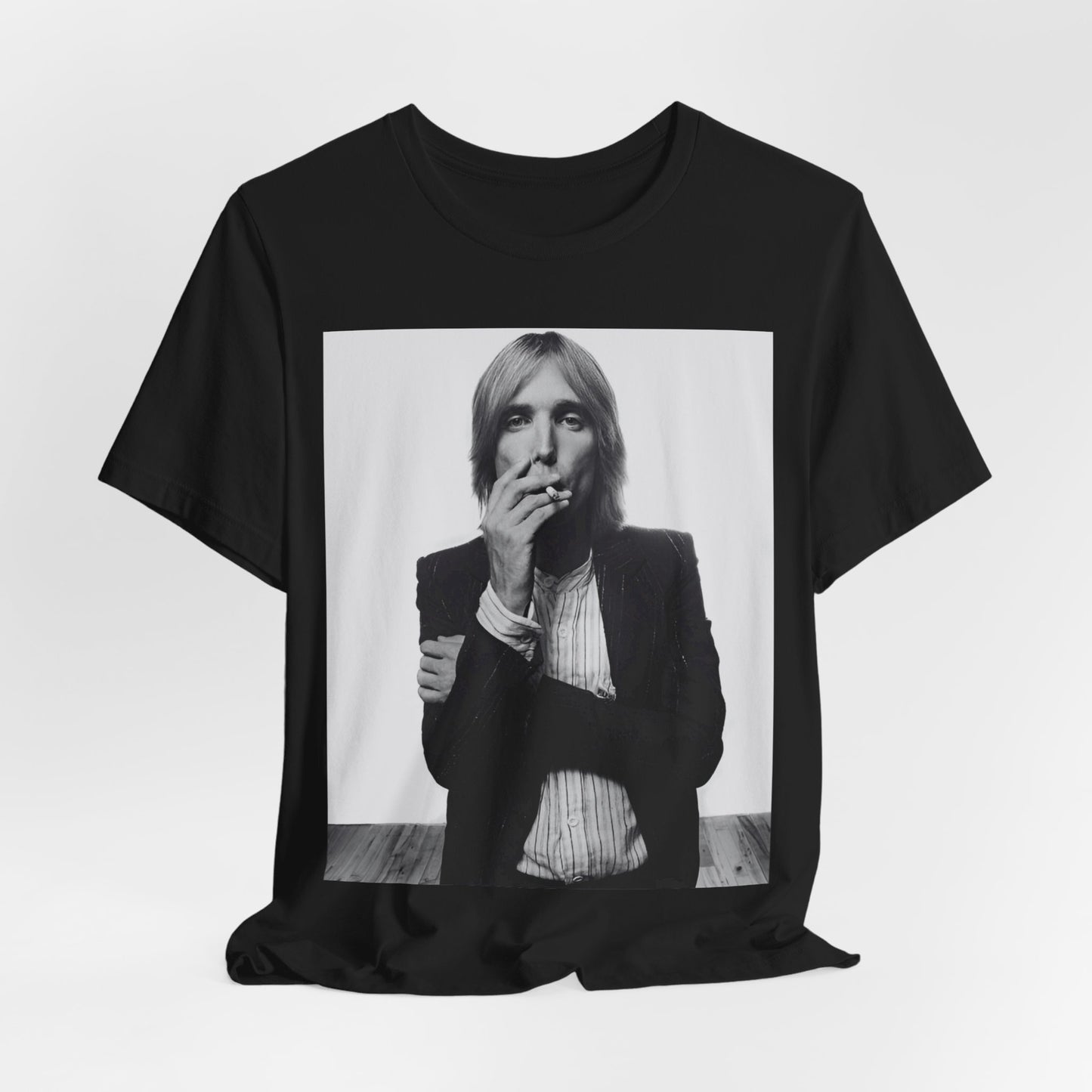 A black graphic t-shirt featuring a black and white graphic or photo of Tom Petty as a Southern rock icon.