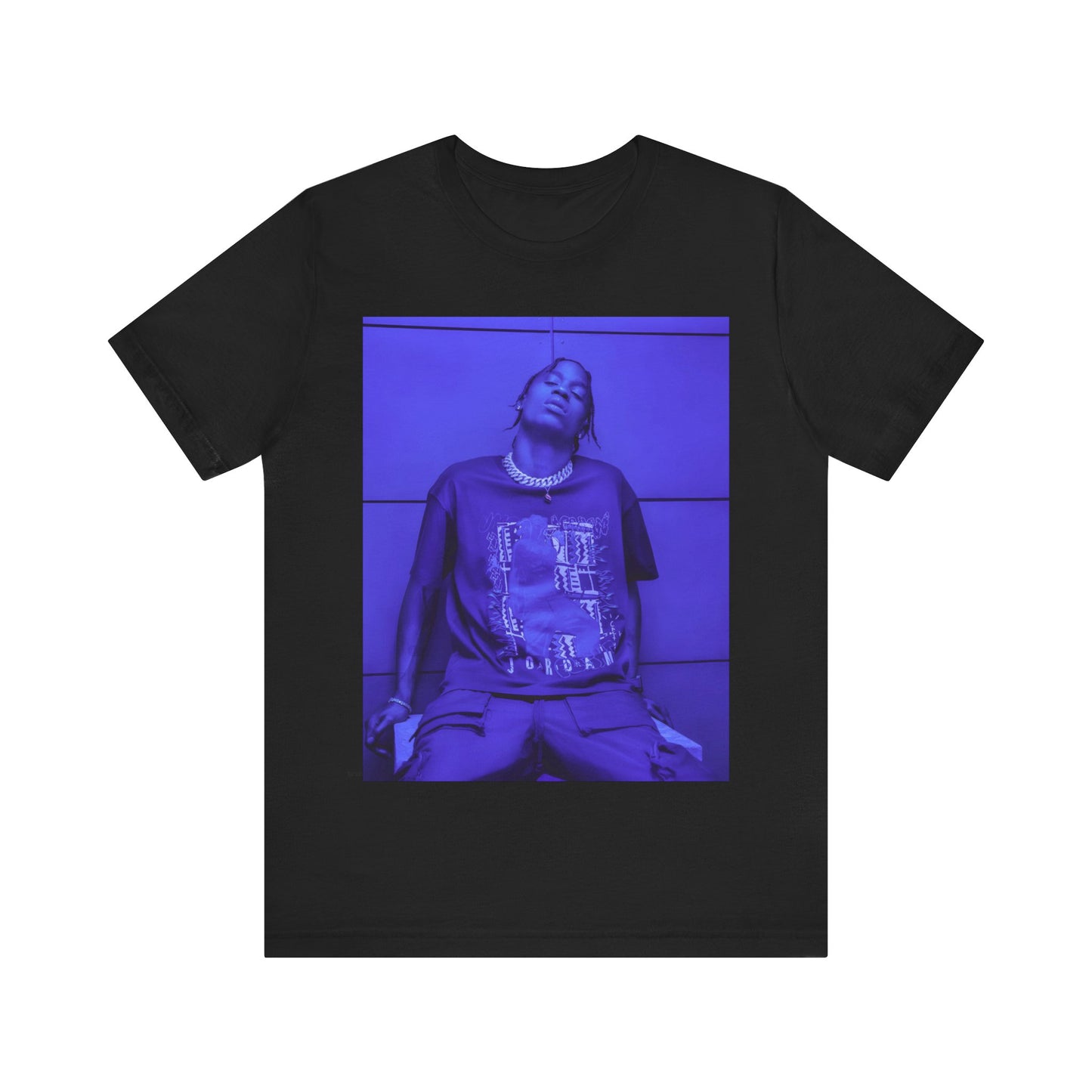 A black graphic t-shirt featuring a timeless trap star graphic of Travis Scott.