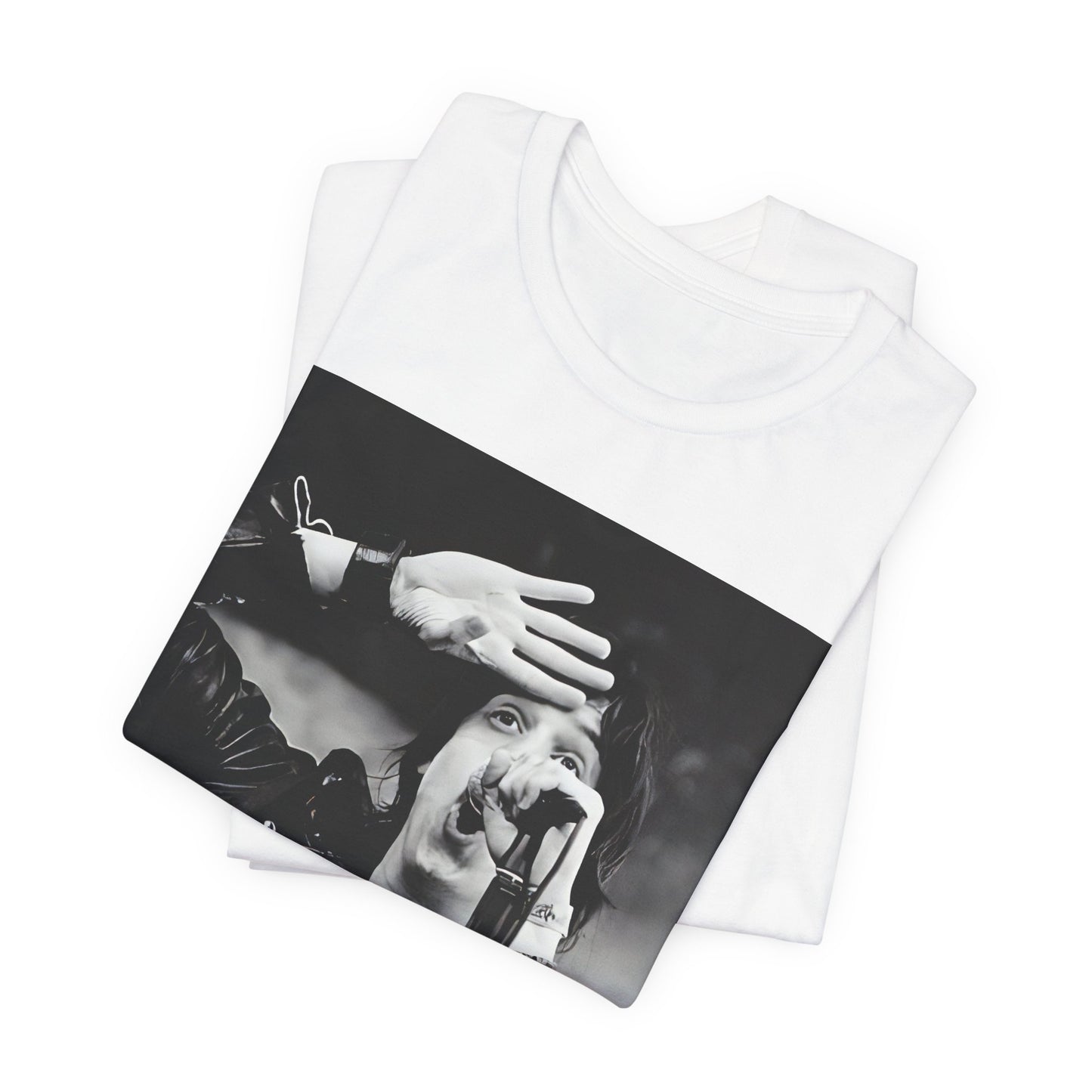 A black graphic t-shirt featuring a black and white portrait photo of The Strokes band.