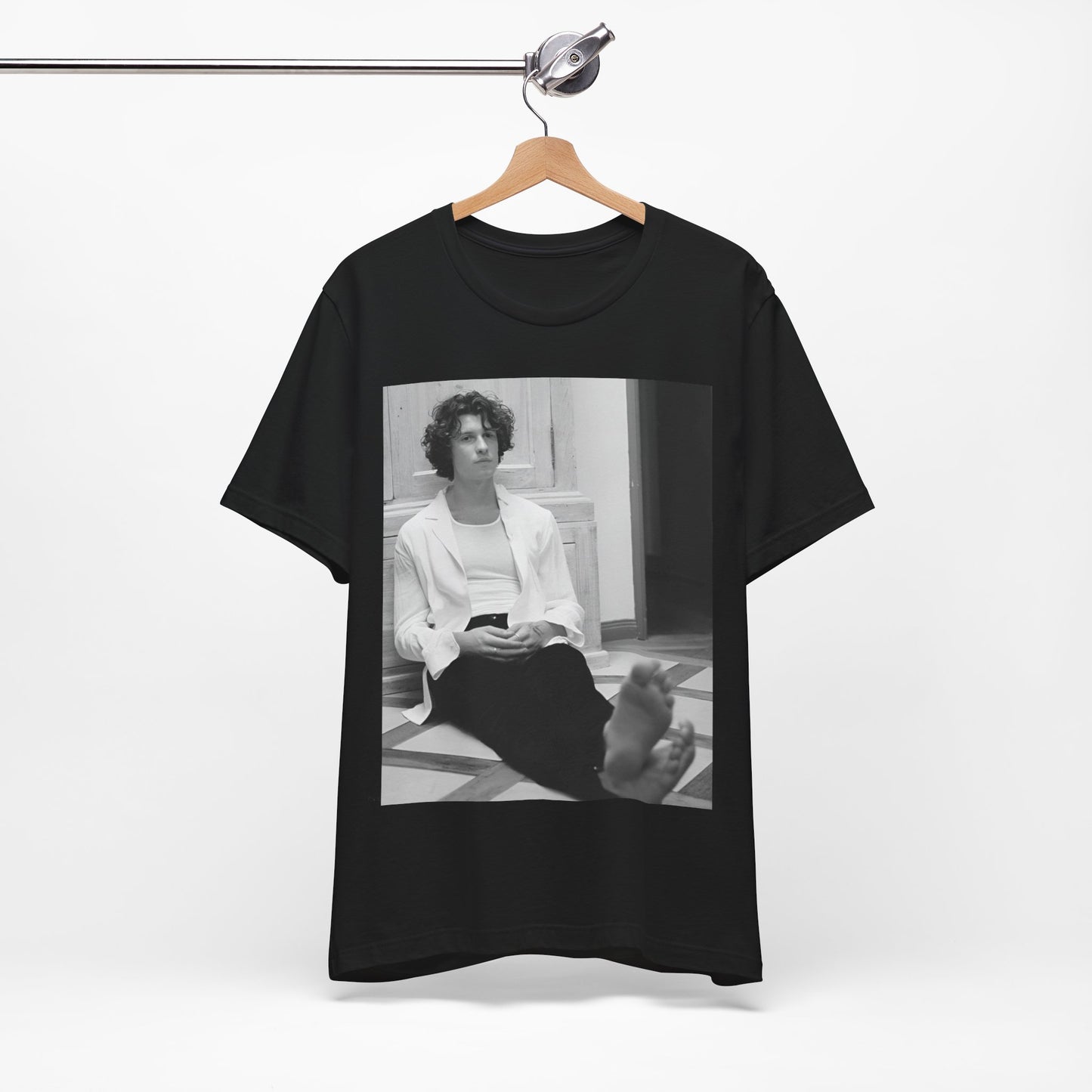 A black graphic t-shirt featuring a vintage casual style graphic of Shawn Mendes.