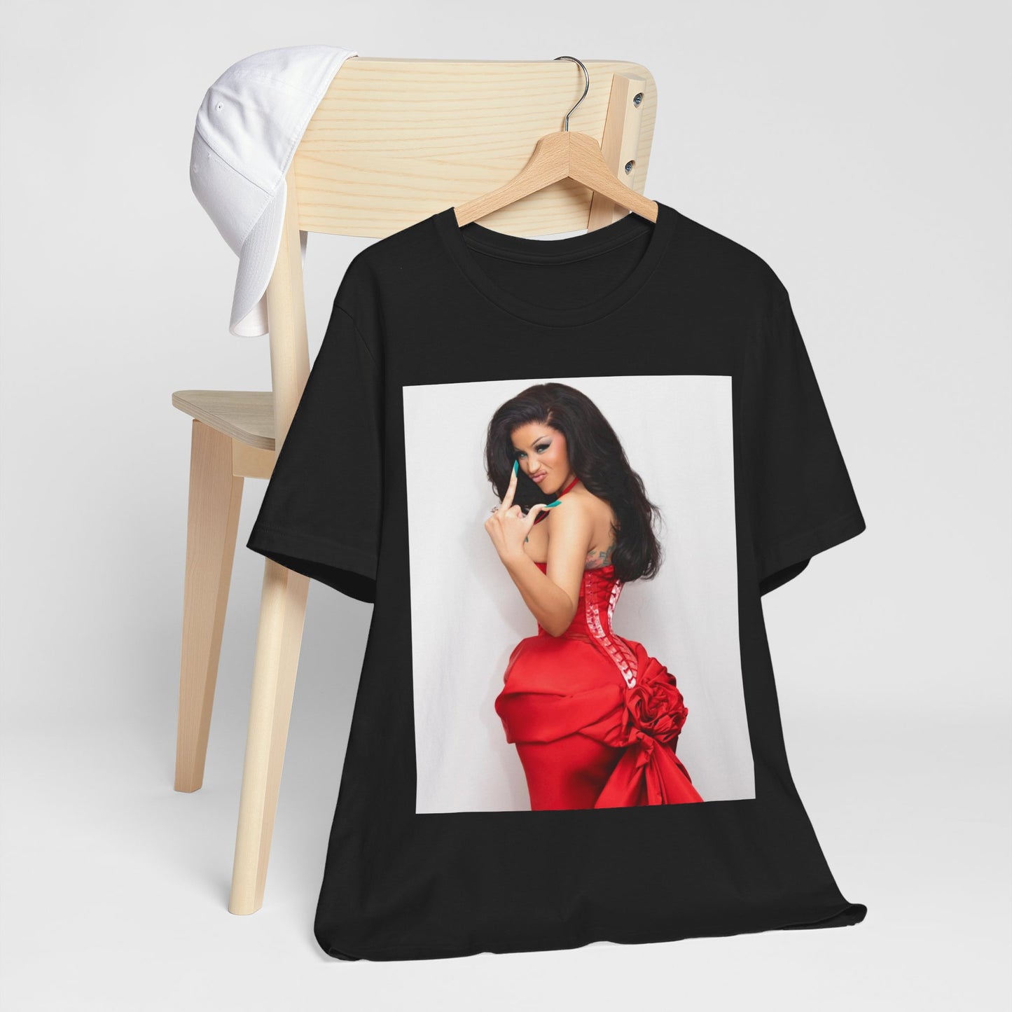 A black graphic t-shirt featuring a graphic of Cardi B making 'the finger' gesture.