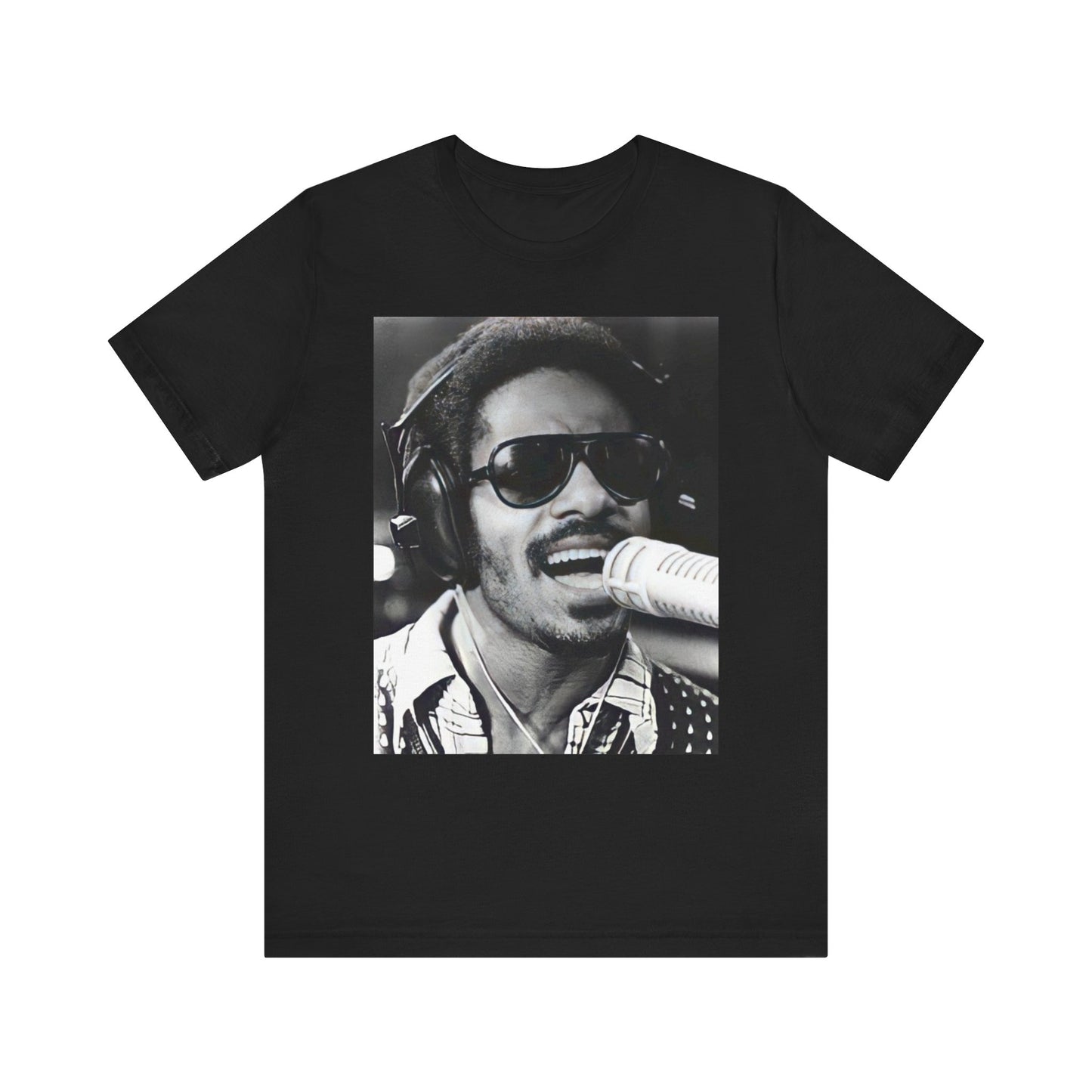 A black graphic t-shirt featuring a graphic of Stevie Wonder as a timeless visionary.
