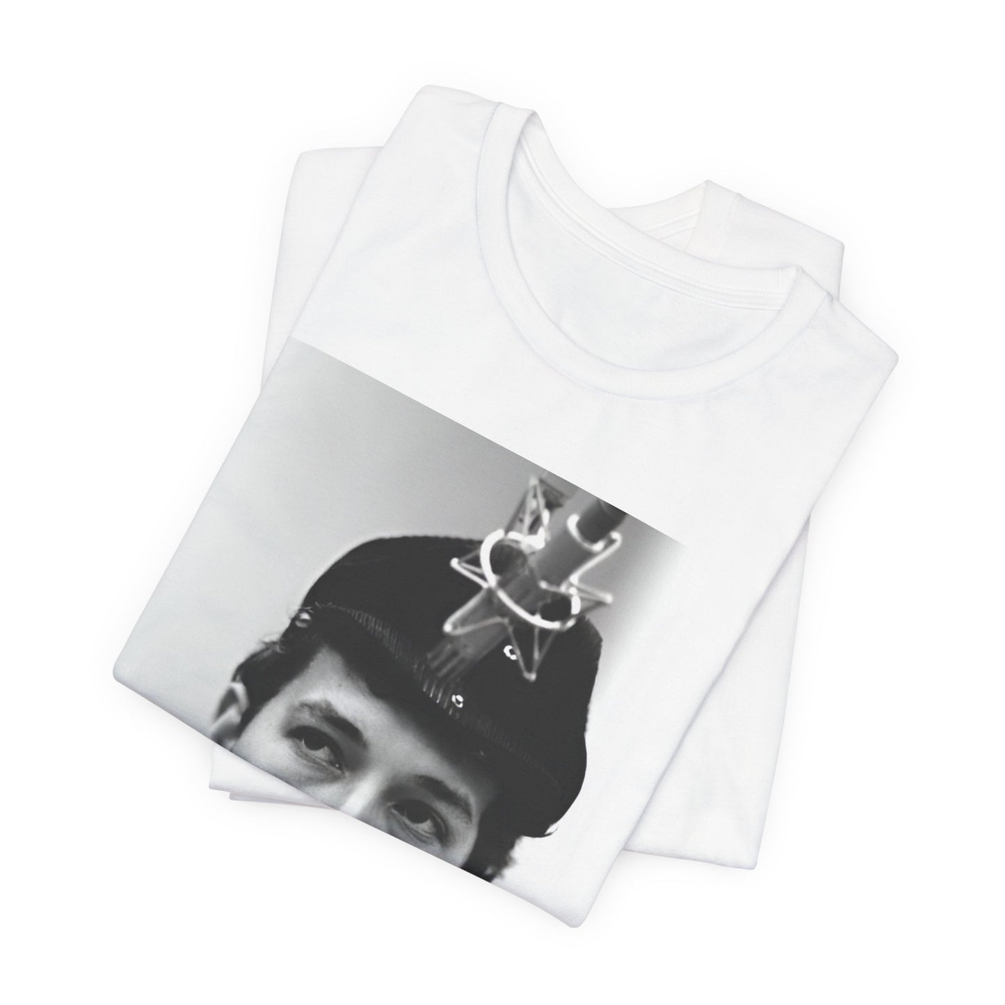 A black graphic t-shirt featuring a graphic of Bob Dylan in an acoustic session setting, possibly with his guitar.