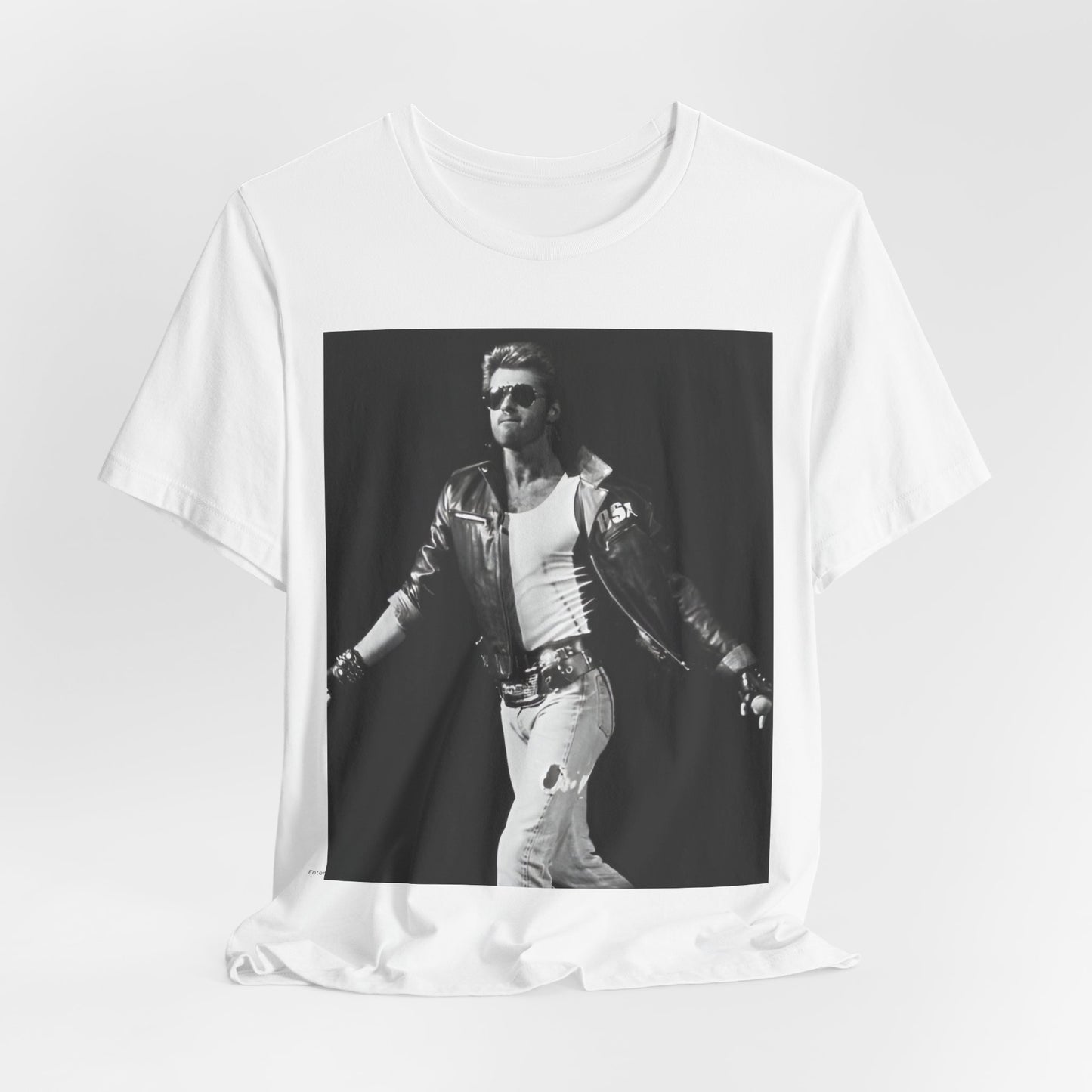 A black graphic t-shirt featuring a retro black and white monochrome graphic or photo of George Michael.