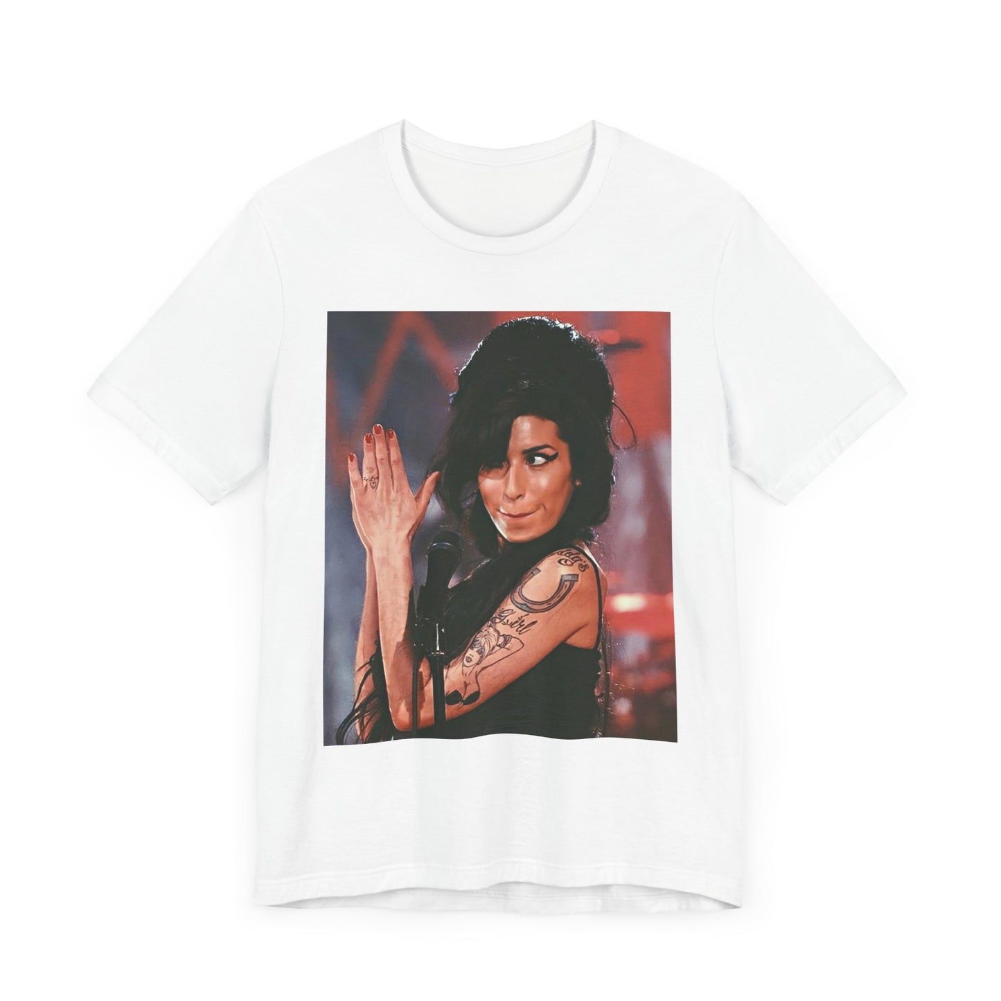 A black graphic t-shirt featuring a photo of Amy Winehouse performing live on stage in 2008, with her signature beehive and expressive singing.