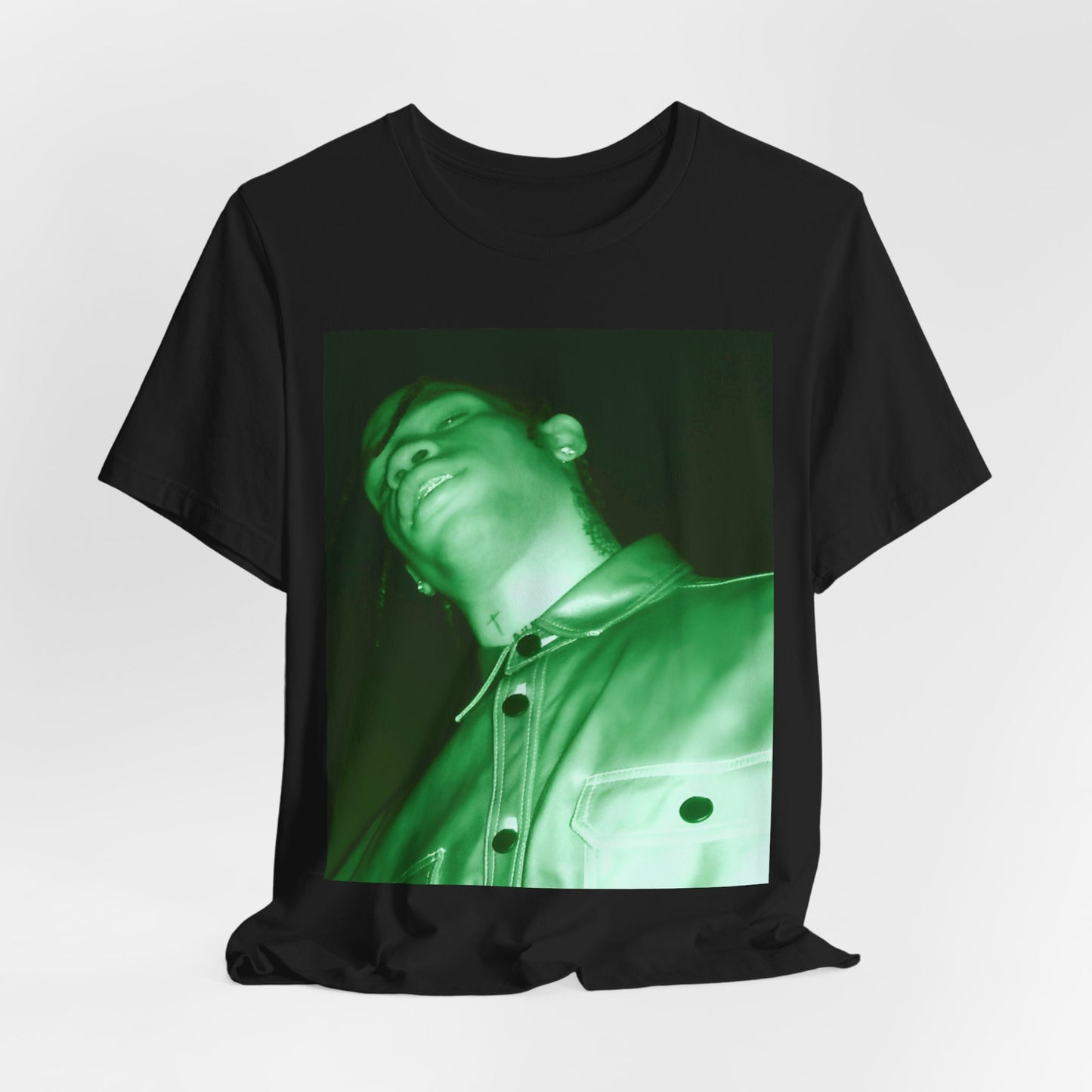 A black graphic t-shirt featuring a graphic of Travis Scott with psychedelic trap vibes.