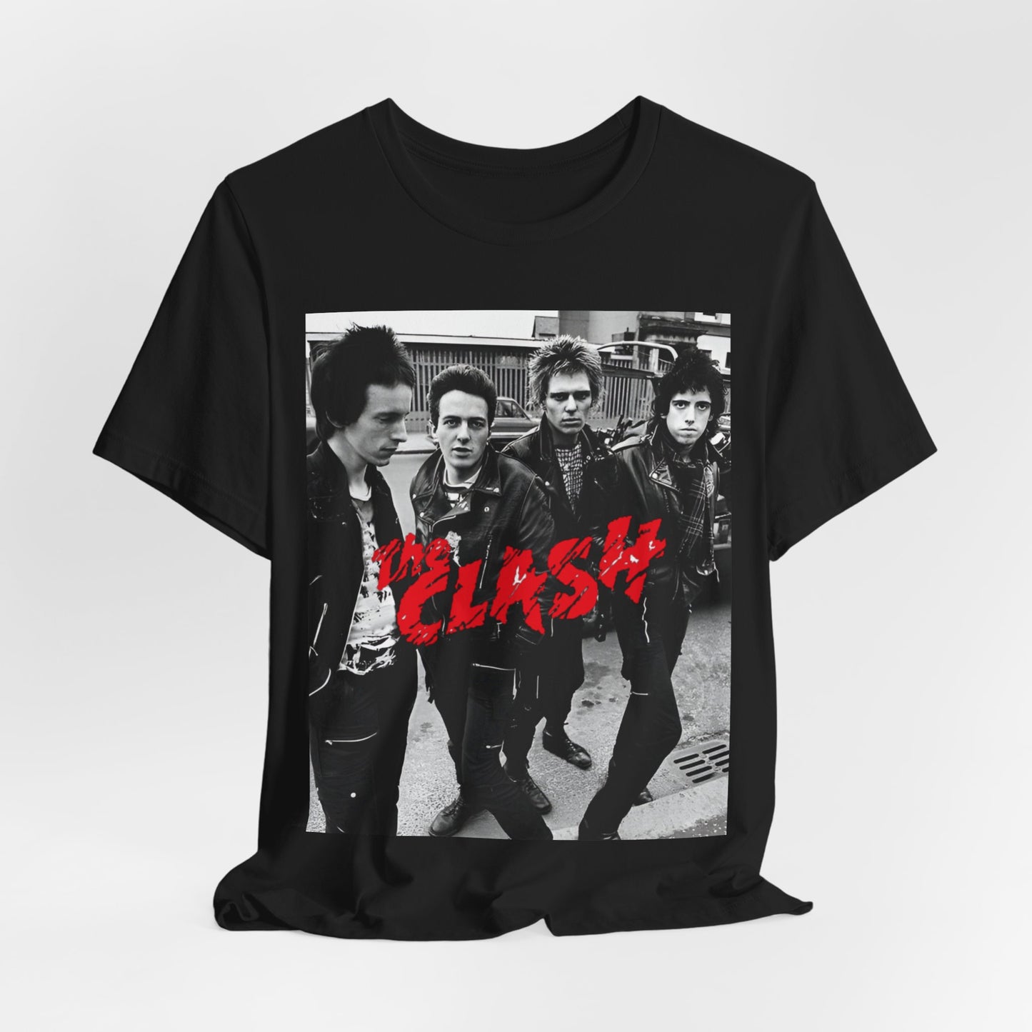 A black graphic t-shirt featuring a graphic of The Clash as punk rock pioneers.