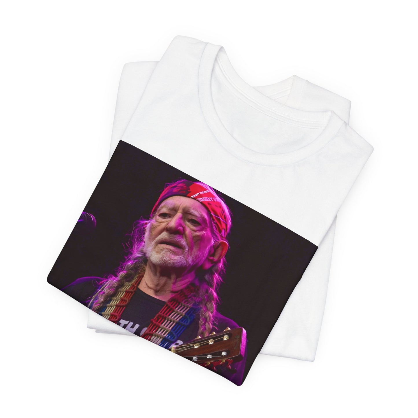A black graphic t-shirt featuring an outlaw country legend graphic of Willie Nelson.