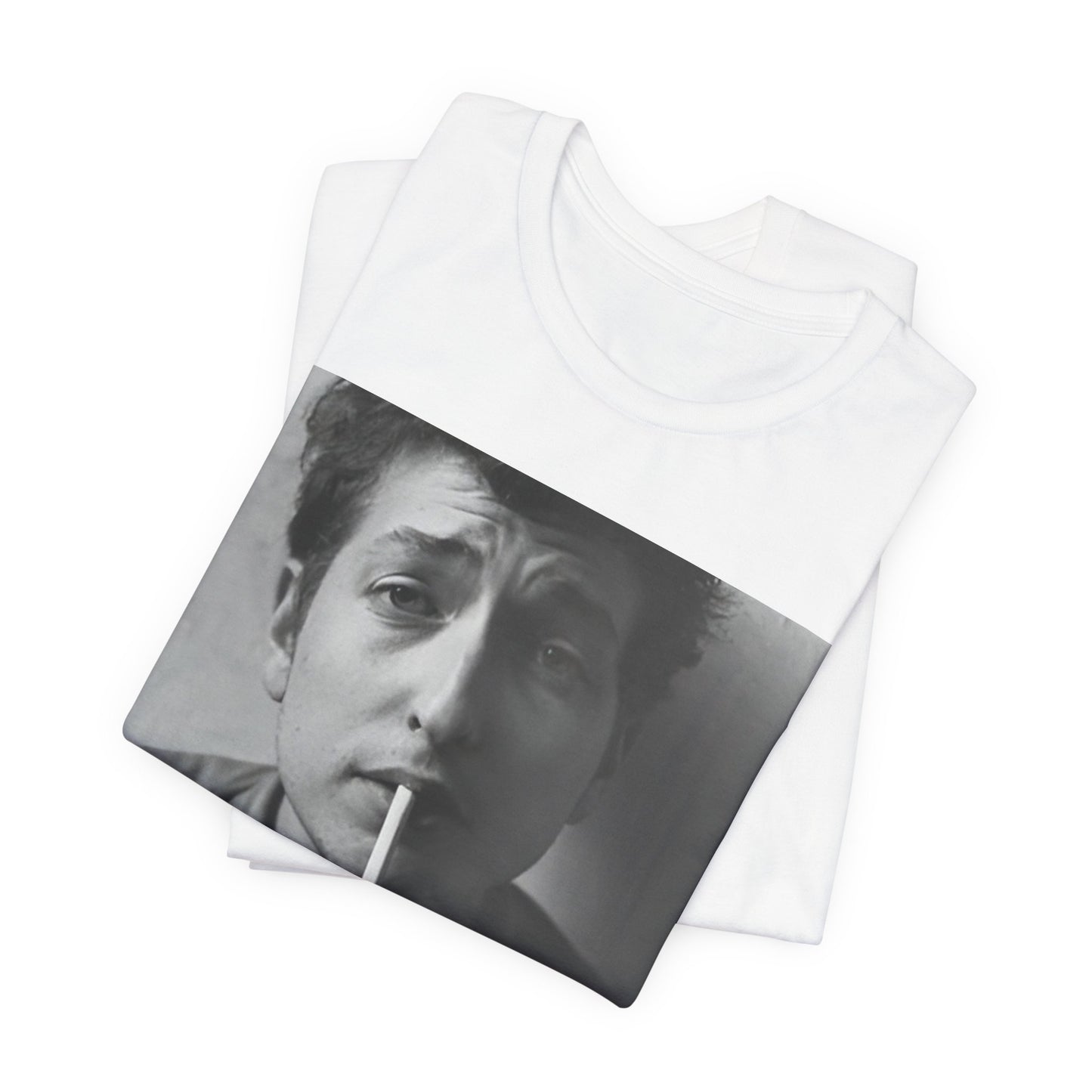 A black graphic t-shirt featuring a graphic of Bob Dylan from the 60s, depicted as a renegade folk icon.