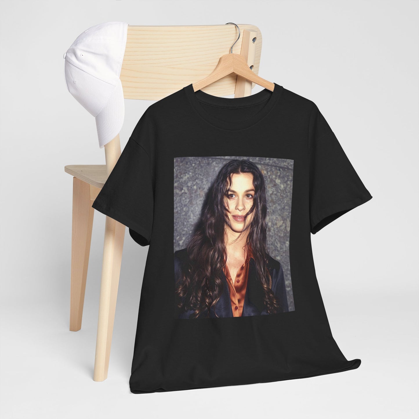 A black graphic t-shirt featuring a classic portrait or graphic of Alanis Morissette.
