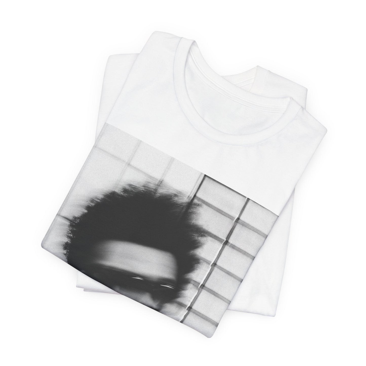 A black graphic t-shirt featuring a blurred graphic of The Weeknd from his 'After Hours' era.