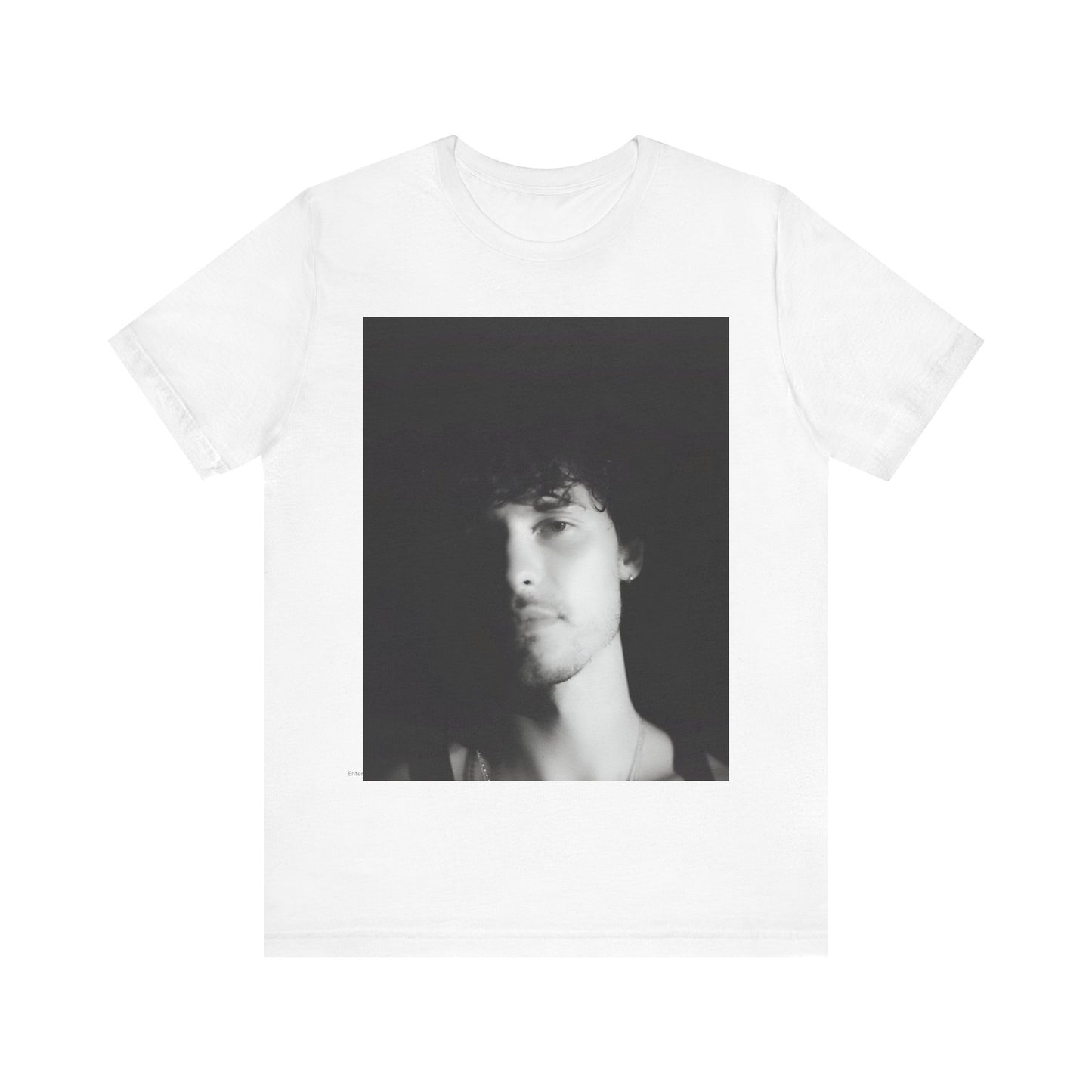 A black graphic t-shirt featuring a black and white portrait photo of Shawn Mendes.