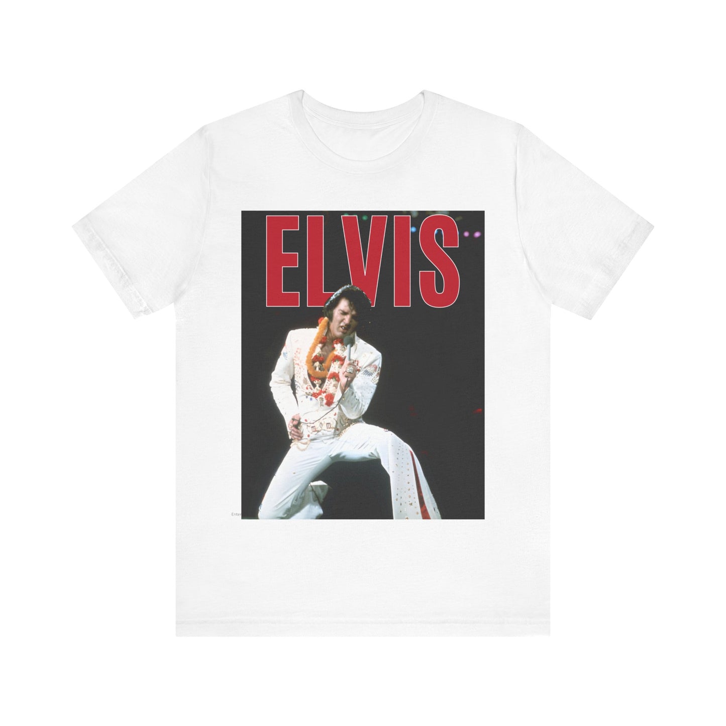 A black graphic t-shirt featuring a glamorous graphic or photo of Elvis Presley on a Las Vegas stage.