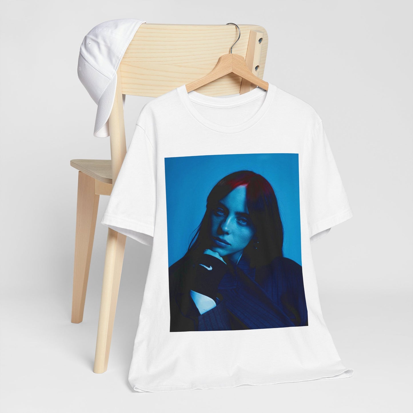 A soft, slightly blurred photo of Billie Eilish, evoking the dreamy and nostalgic feel of her song 'Ocean Eyes,' printed on a t-shirt.