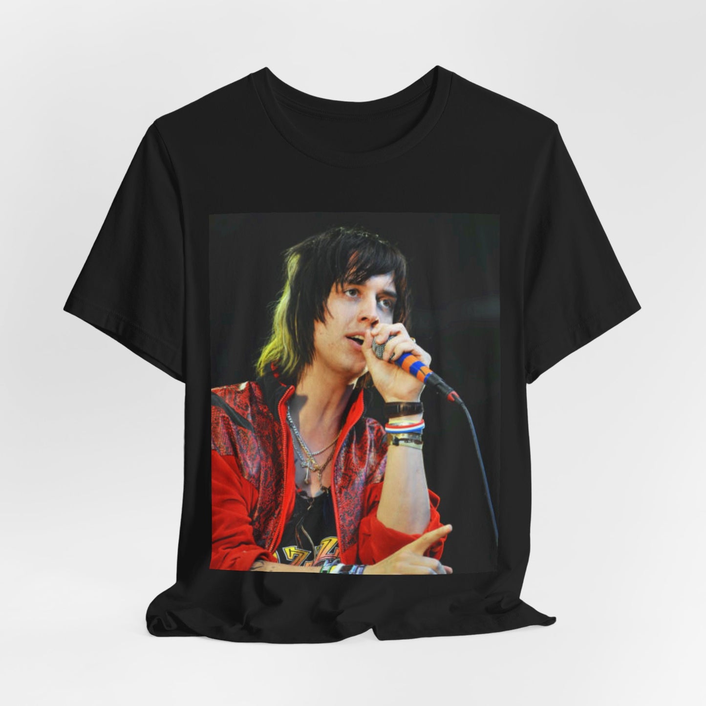 A black graphic t-shirt featuring a vintage indie rock graphic of The Strokes.