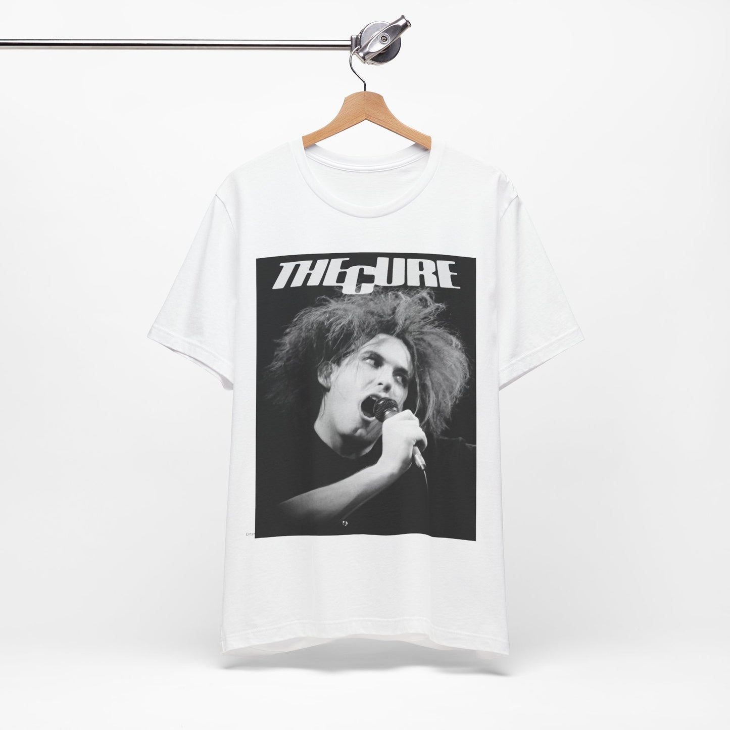 A black graphic t-shirt featuring a graphic of The Cure with a dark romanticism core aesthetic.