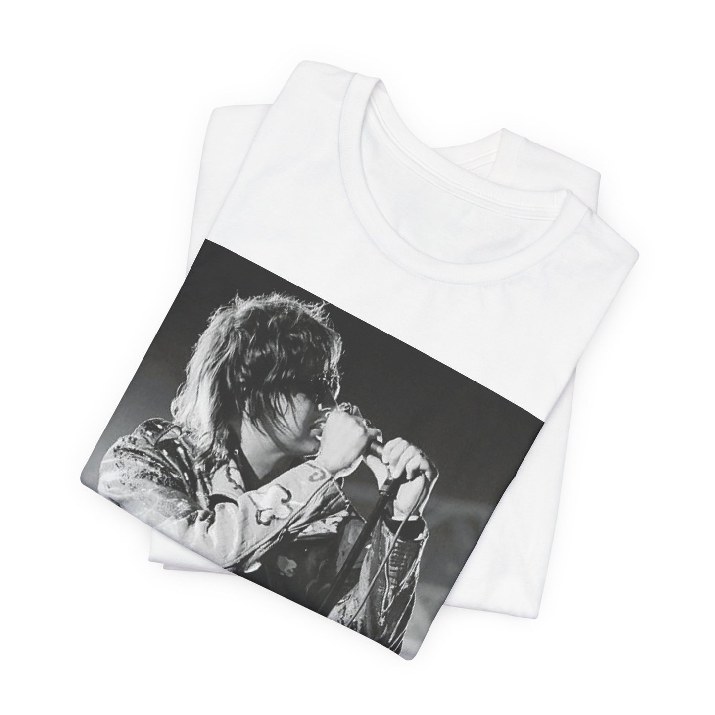 A black graphic t-shirt featuring a vintage graphic related to The Strokes' 'Last Nite' song or era.