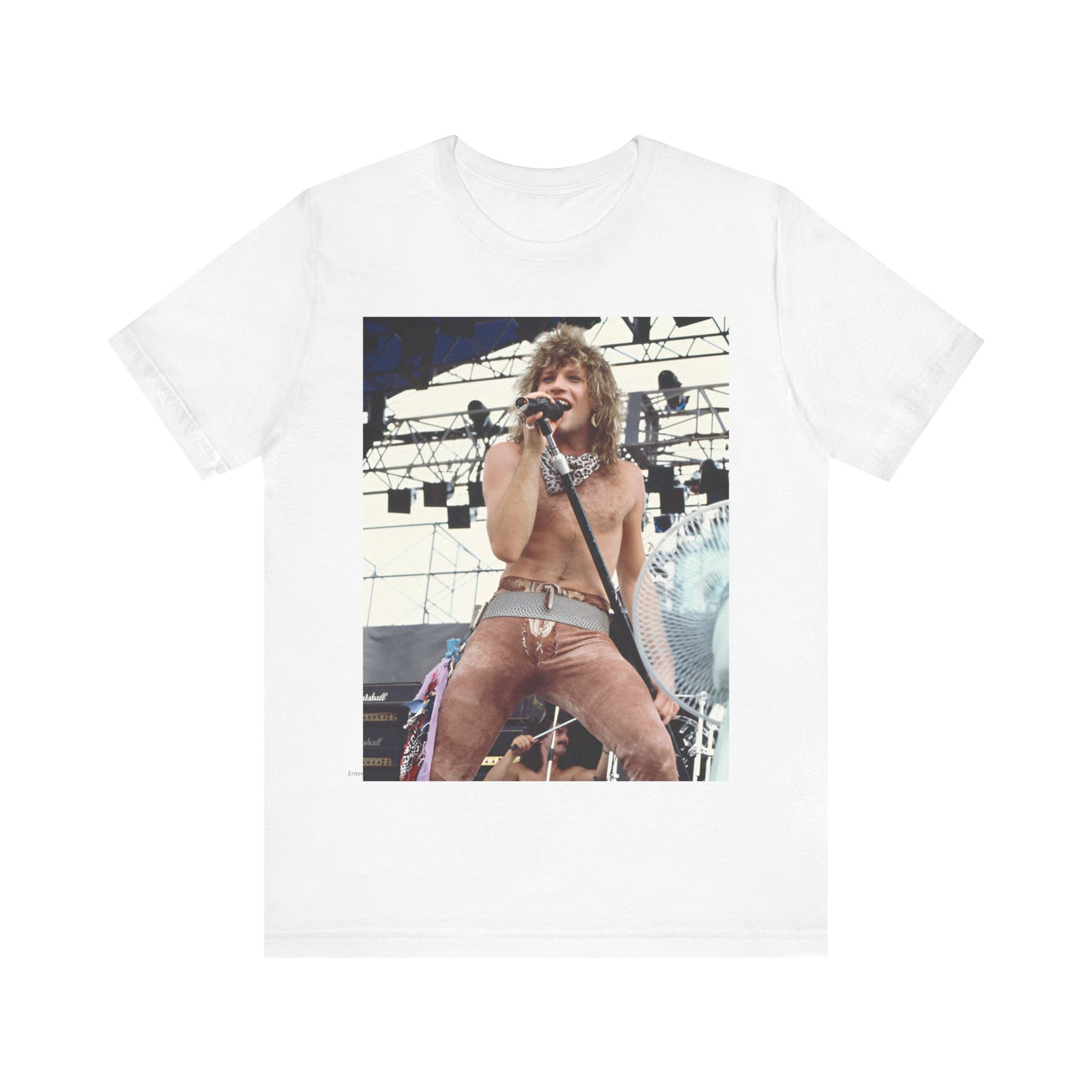 A black graphic t-shirt featuring a dynamic graphic or photo of Bon Jovi performing live on stage with a fierce intensity.