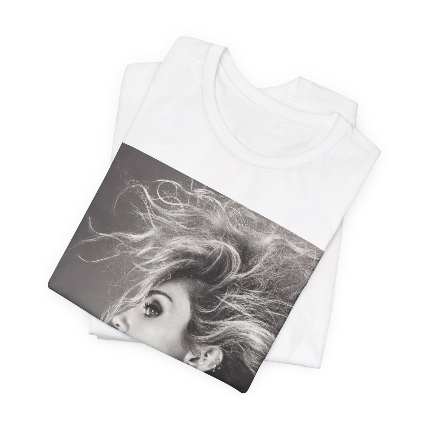 A black graphic t-shirt featuring a graphic of Miley Cyrus as a grunge rockstar.