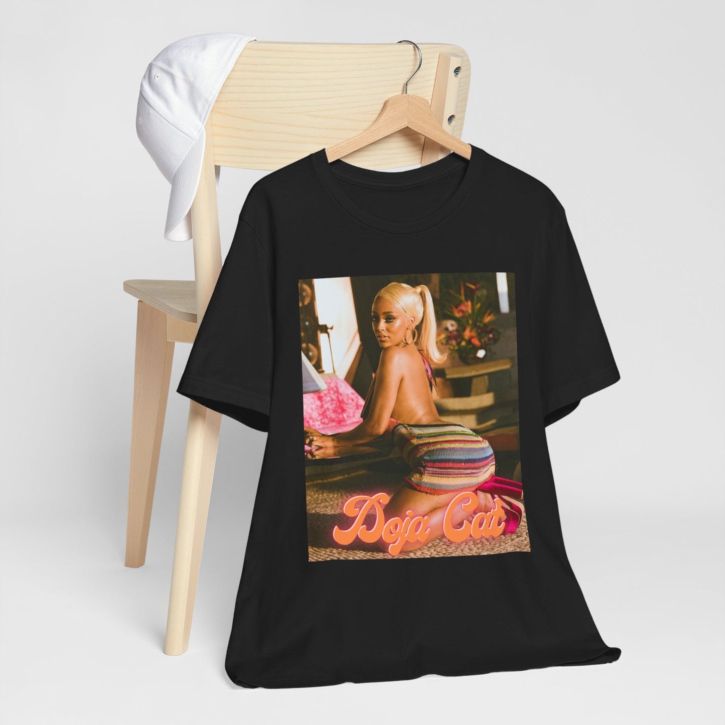 A black graphic t-shirt featuring a retro disco graphic related to Doja Cat's 'Say So' song.