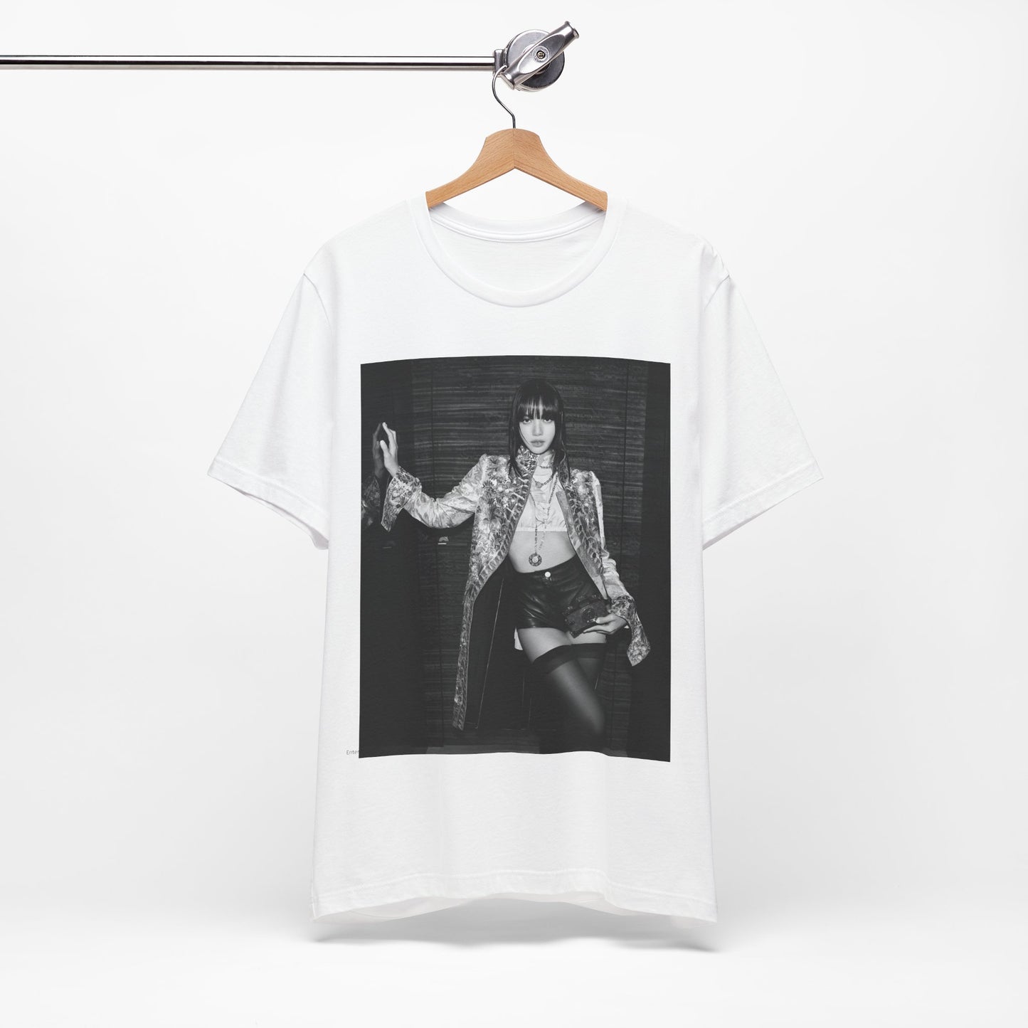 A black graphic t-shirt featuring a black and white, monochrome graphic or photo of Lisa.