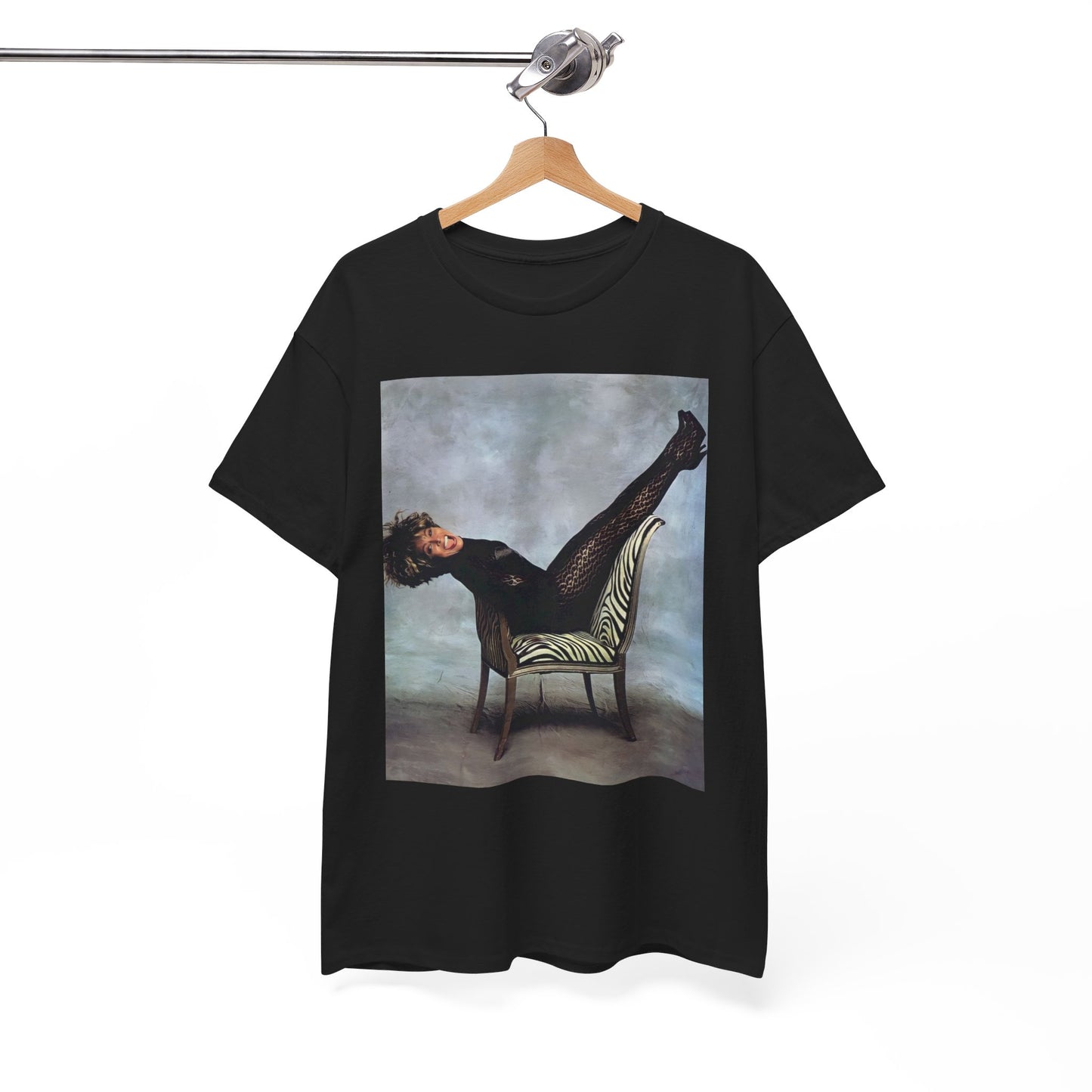 A black graphic t-shirt featuring a bold rock superstar graphic of Tina Turner.