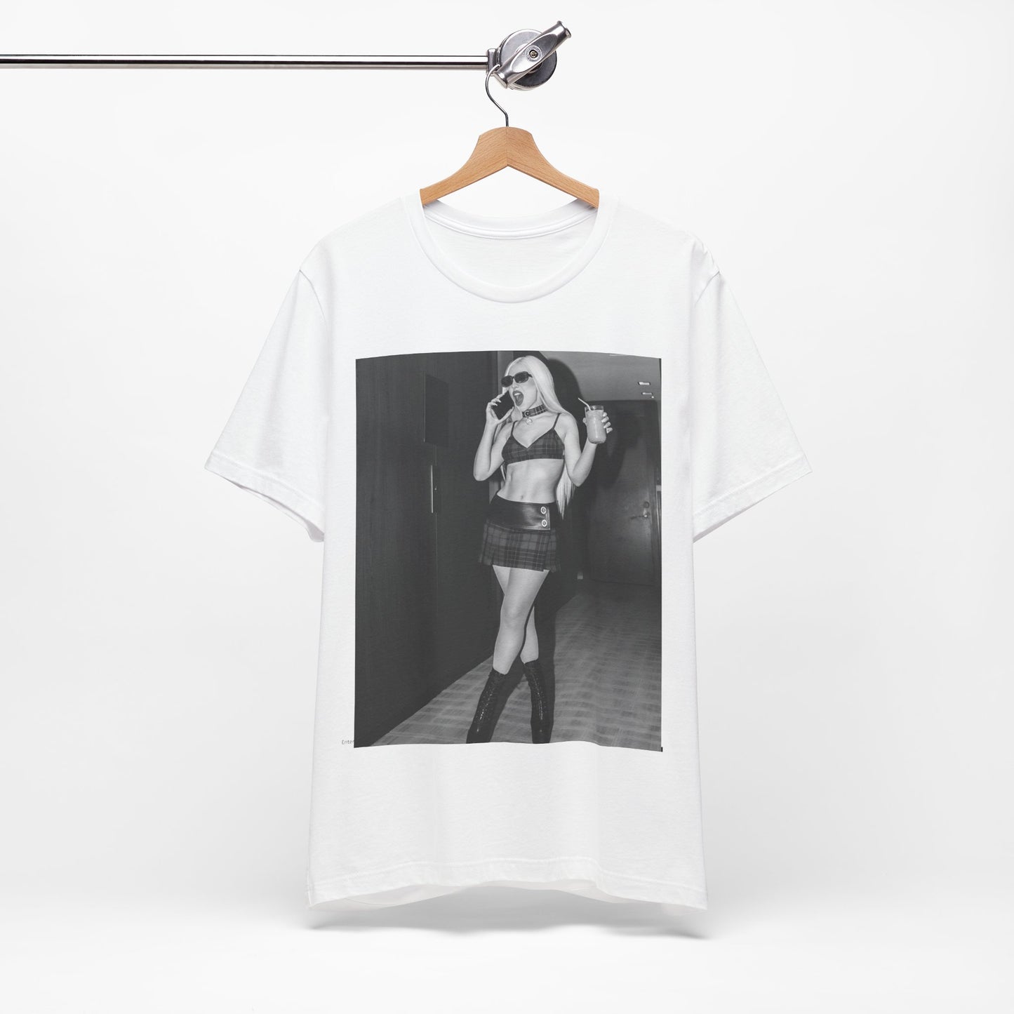 A black graphic t-shirt featuring a graphic of Ava Max with a 'rebel chic' or edgy pop aesthetic.