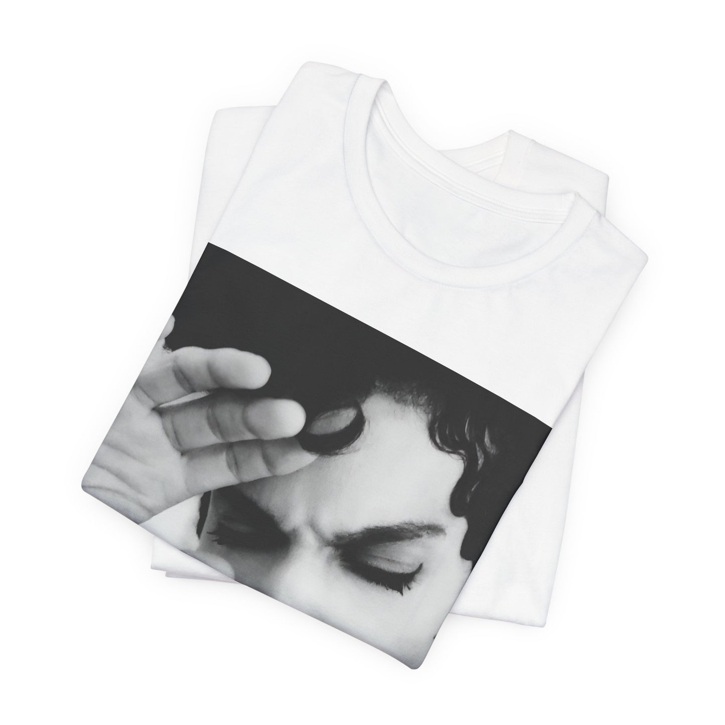 A black graphic t-shirt featuring a black and white graphic or photo portrait of Prince.