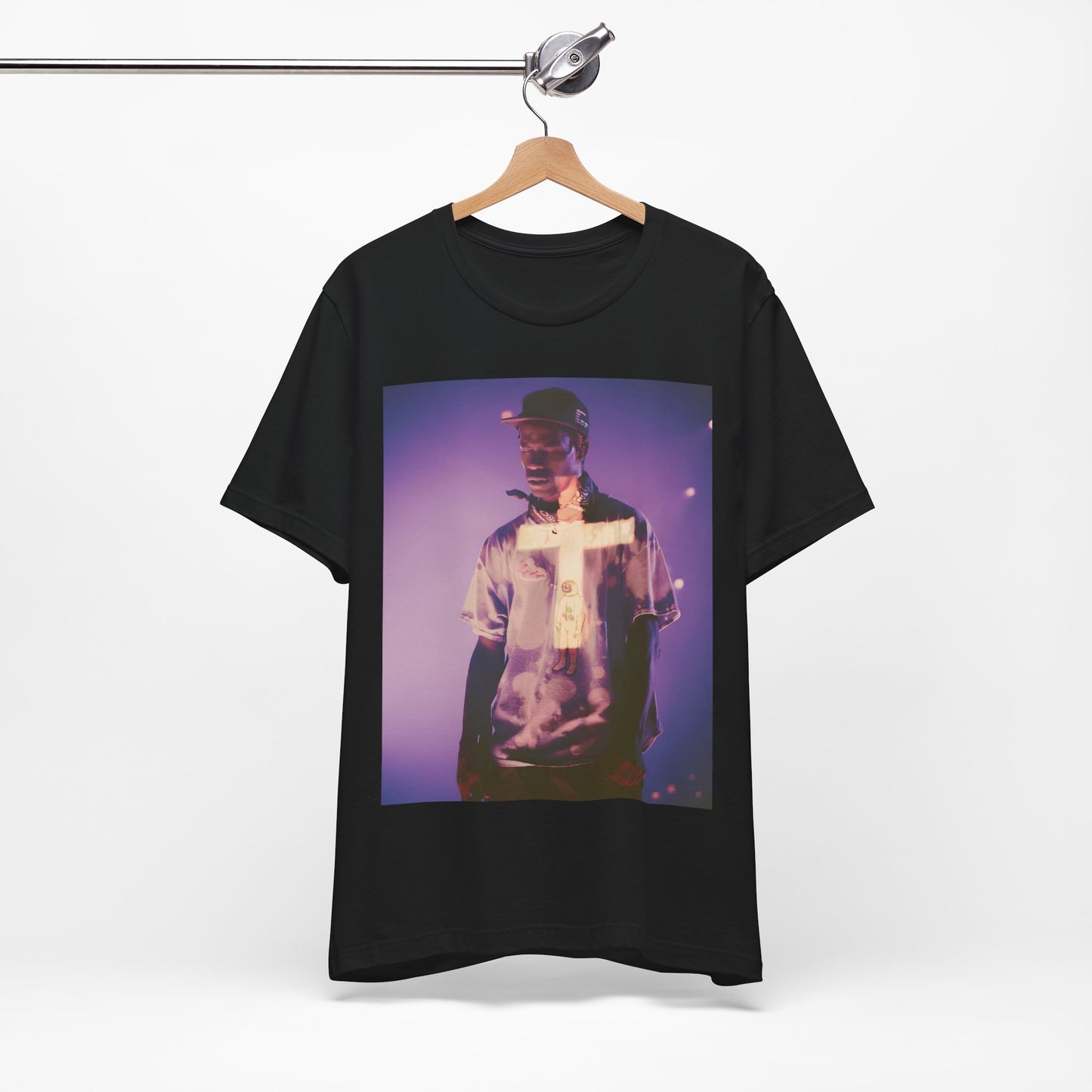 A black graphic t-shirt featuring a graphic of Travis Scott with dark fantasy vibes.