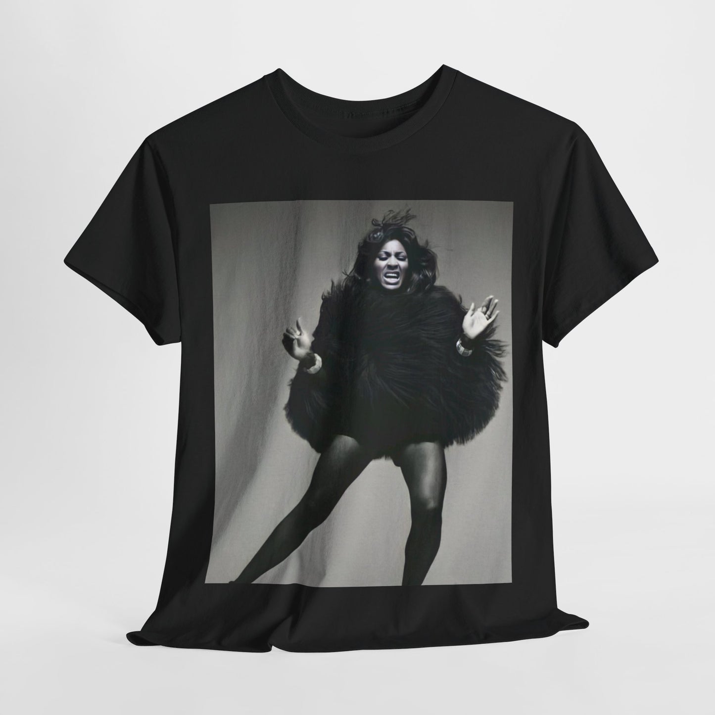 A black graphic t-shirt featuring a black and white portrait photo of Tina Turner.
