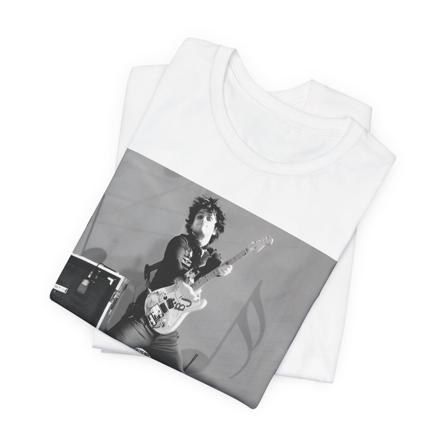 A black graphic t-shirt featuring a graphic of Billie Joe Armstrong from Green Day jumping on stage during a performance.