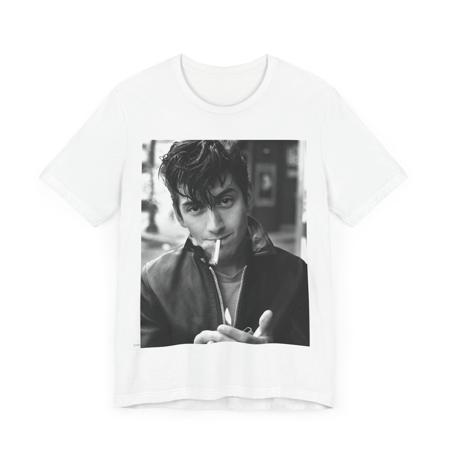 A black graphic t-shirt featuring a graphic of Alex Turner from Arctic Monkeys, in a rock star pose or setting.
