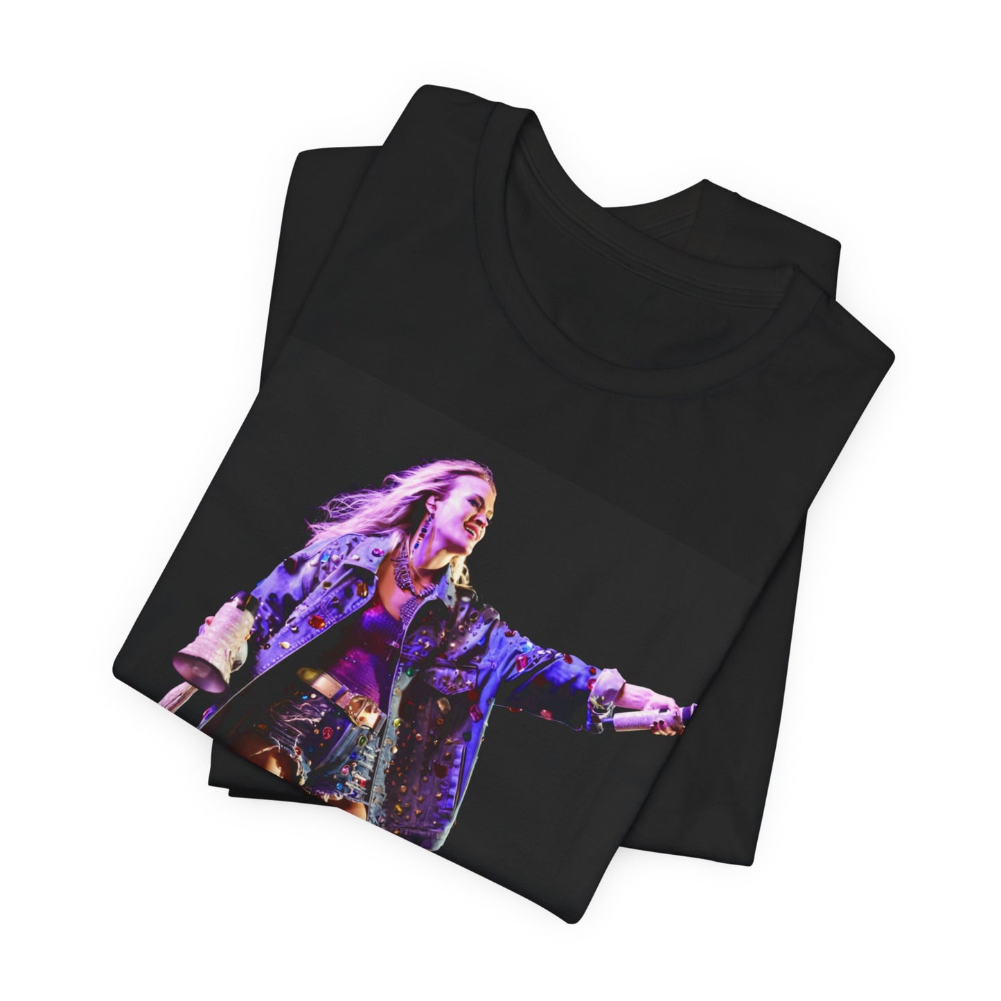 A black graphic t-shirt featuring a graphic of Carrie Underwood with Nashville-themed elements or skyline.