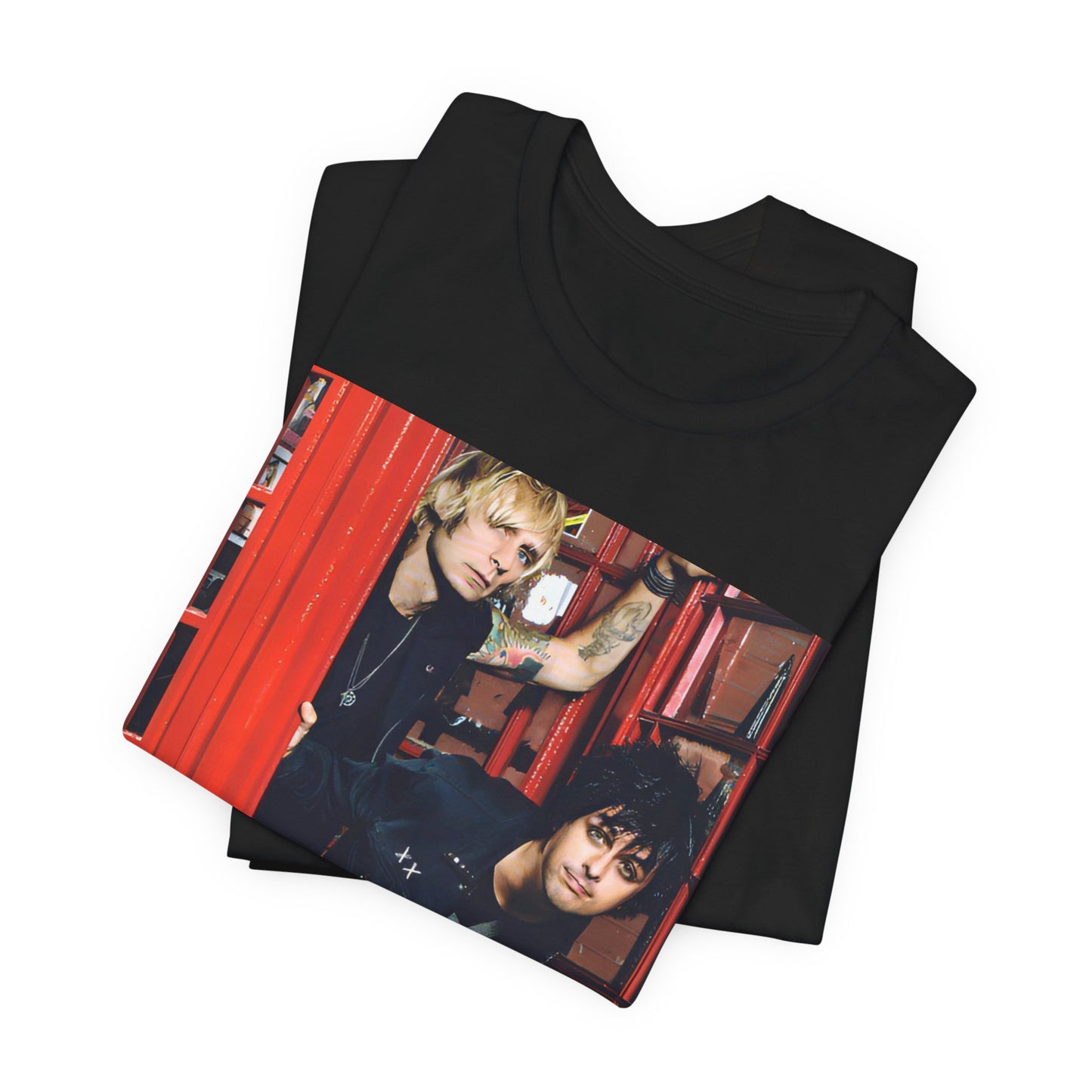 A black graphic t-shirt featuring a photo of Green Day members near a classic red London telephone box.