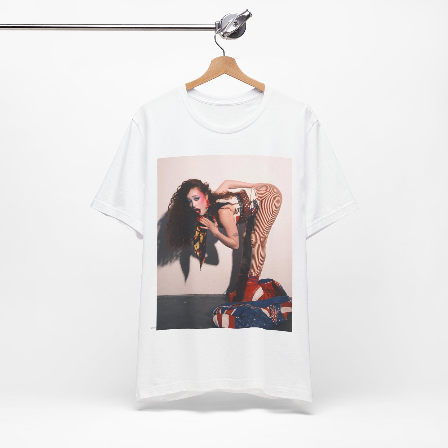 A black graphic t-shirt featuring a graphic of Chappell Roan with a 'Hot to Go!' theme, emphasizing her drag icon persona.