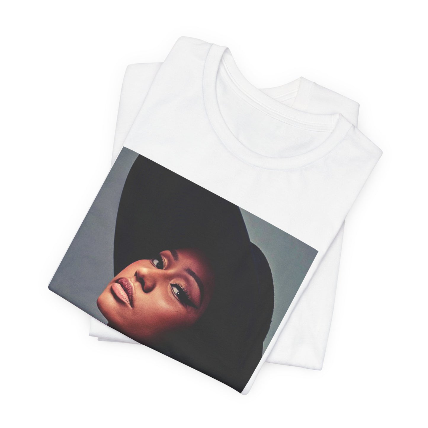A black graphic t-shirt featuring a graphic of Nicki Minaj as a streetwear icon.