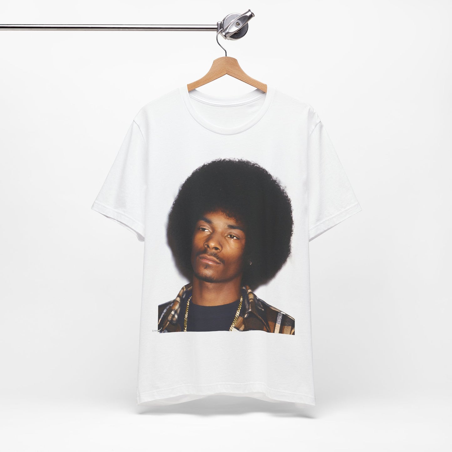 A black graphic t-shirt featuring a 90s vintage hip hop icon graphic of Snoop Dogg.