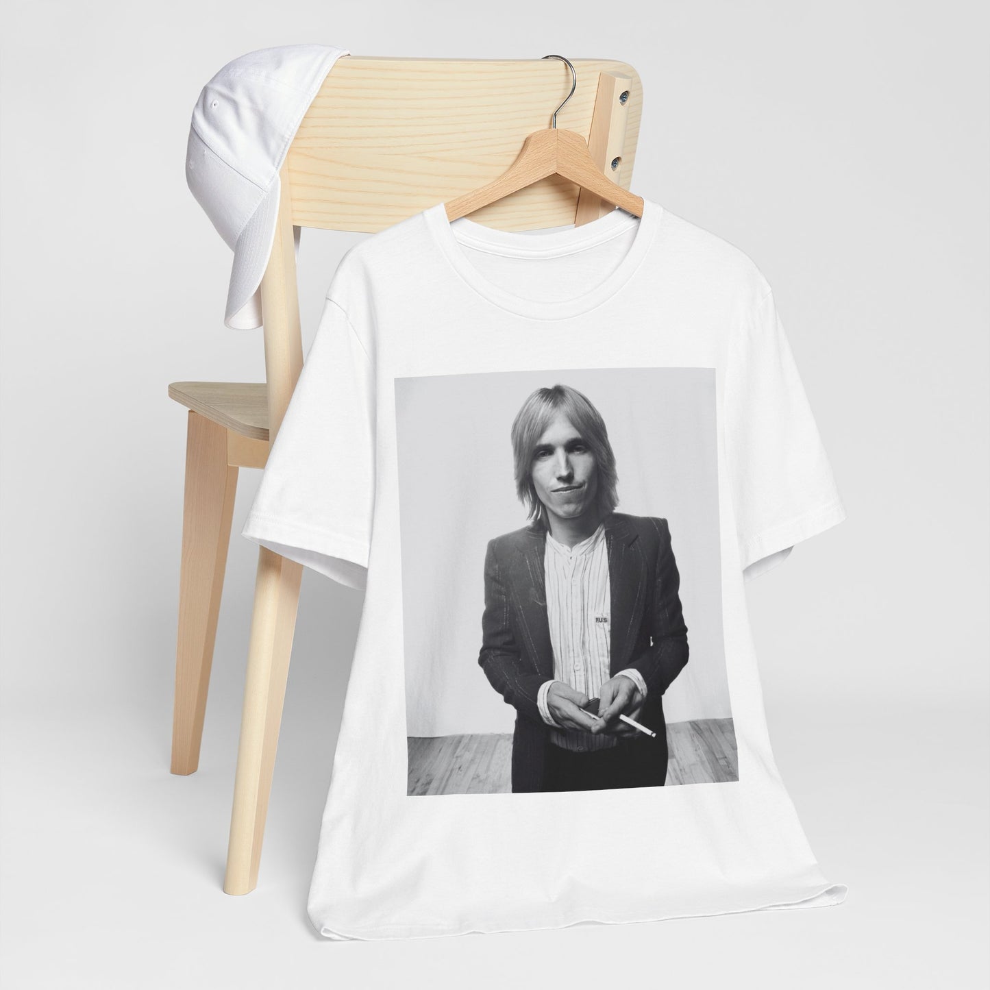 A black graphic t-shirt featuring a graphic of Tom Petty with rock legend vibes.