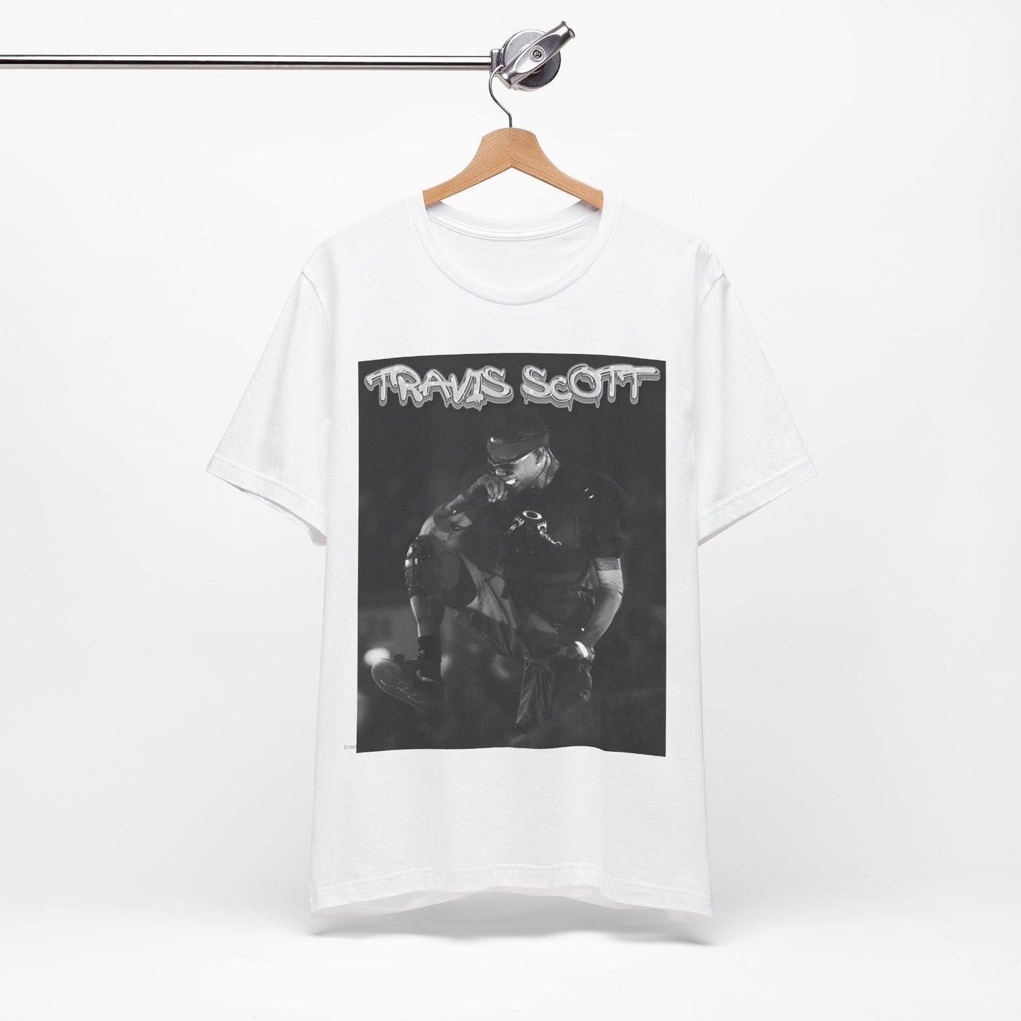 A black graphic t-shirt featuring a casual rap fan graphic of Travis Scott.