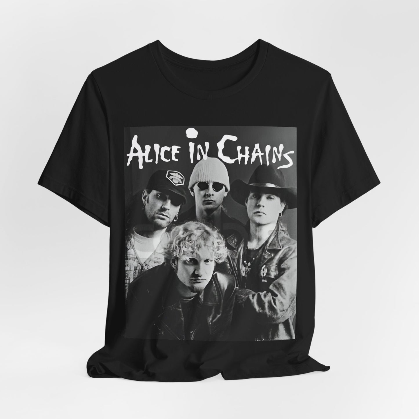 A black graphic t-shirt featuring a black and white photographic portrait of the band Alice In Chains, capturing their iconic grunge look.