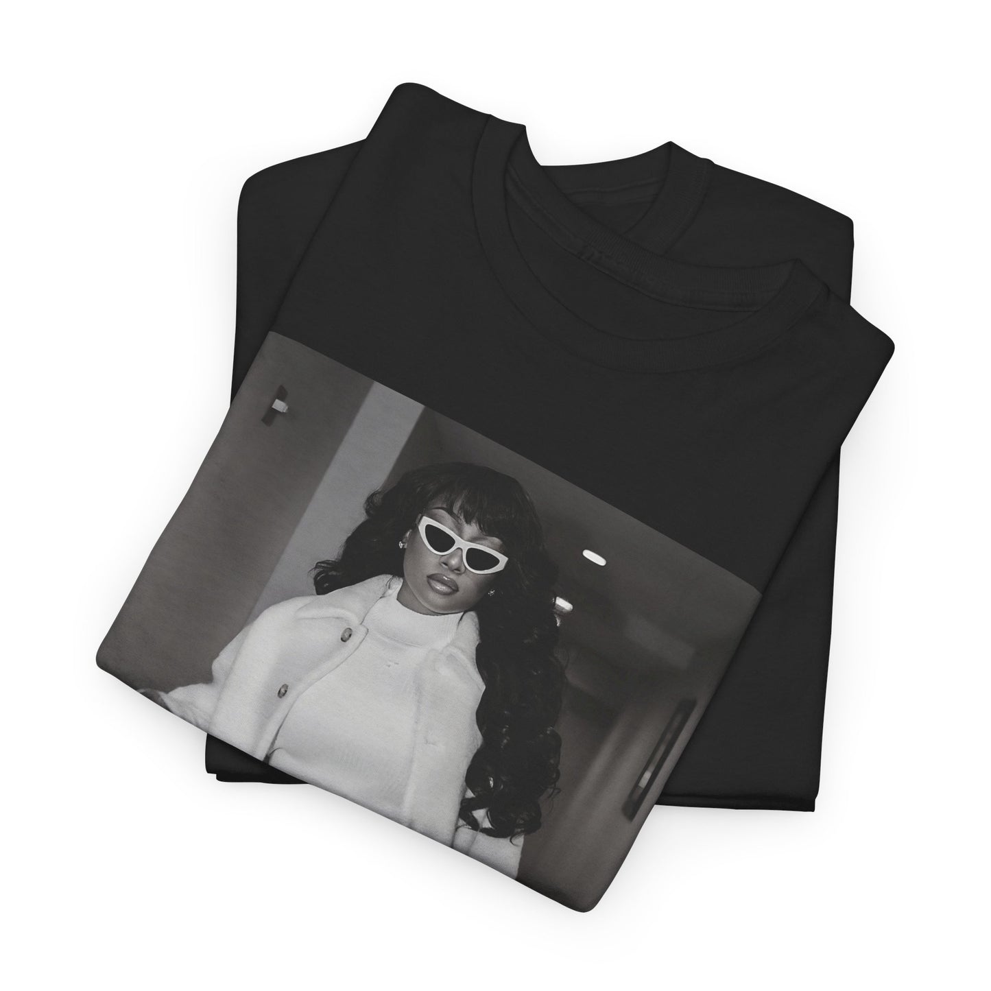 A black graphic t-shirt featuring a black and white portrait photo of Megan Thee Stallion.