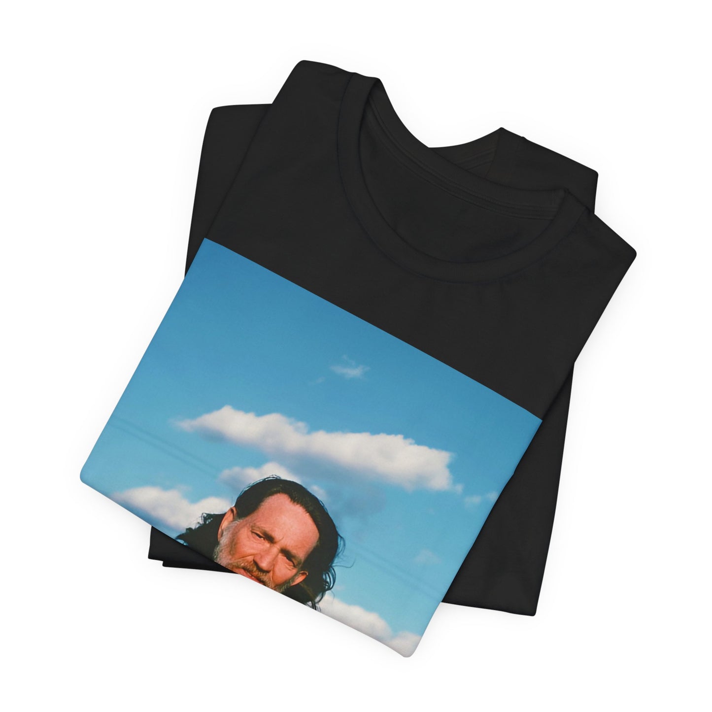 A black graphic t-shirt featuring a classic outlaw country graphic of Willie Nelson.