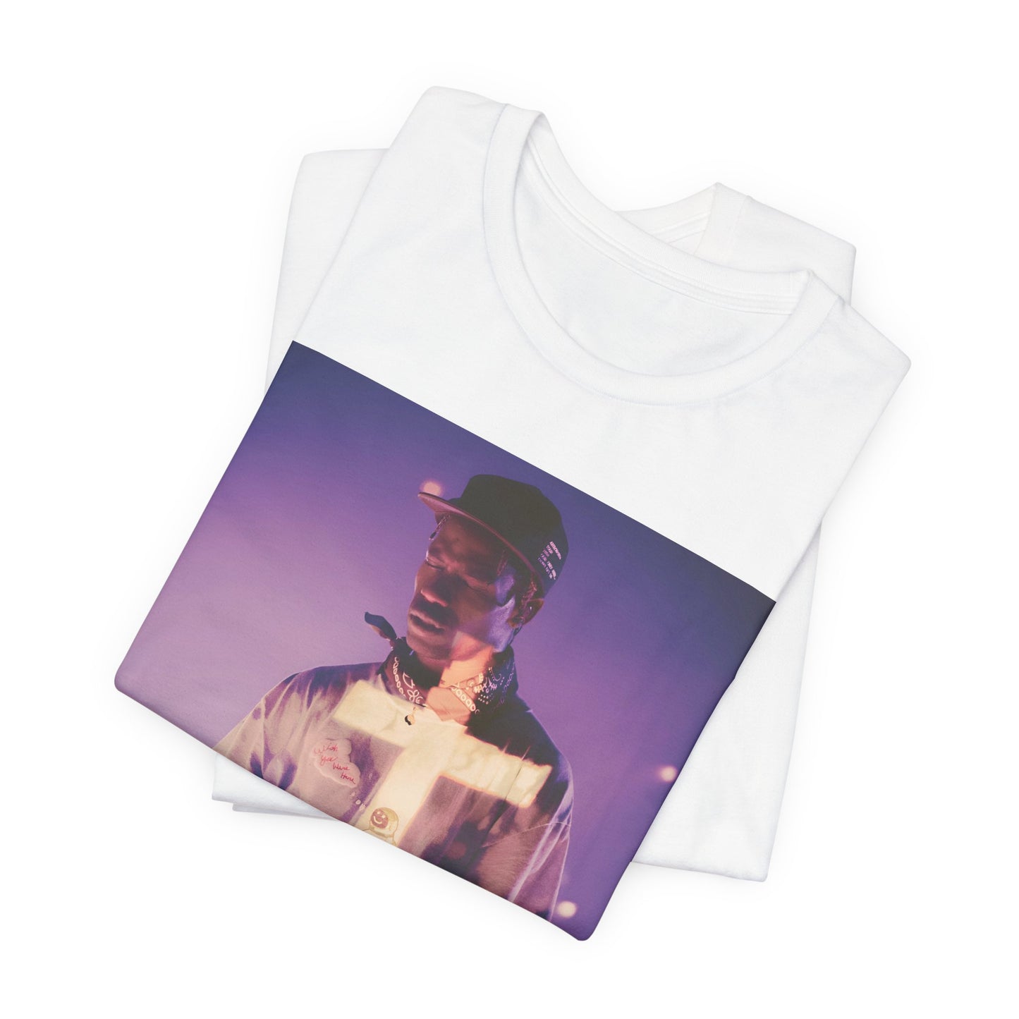 A black graphic t-shirt featuring a graphic of Travis Scott with dark fantasy vibes.